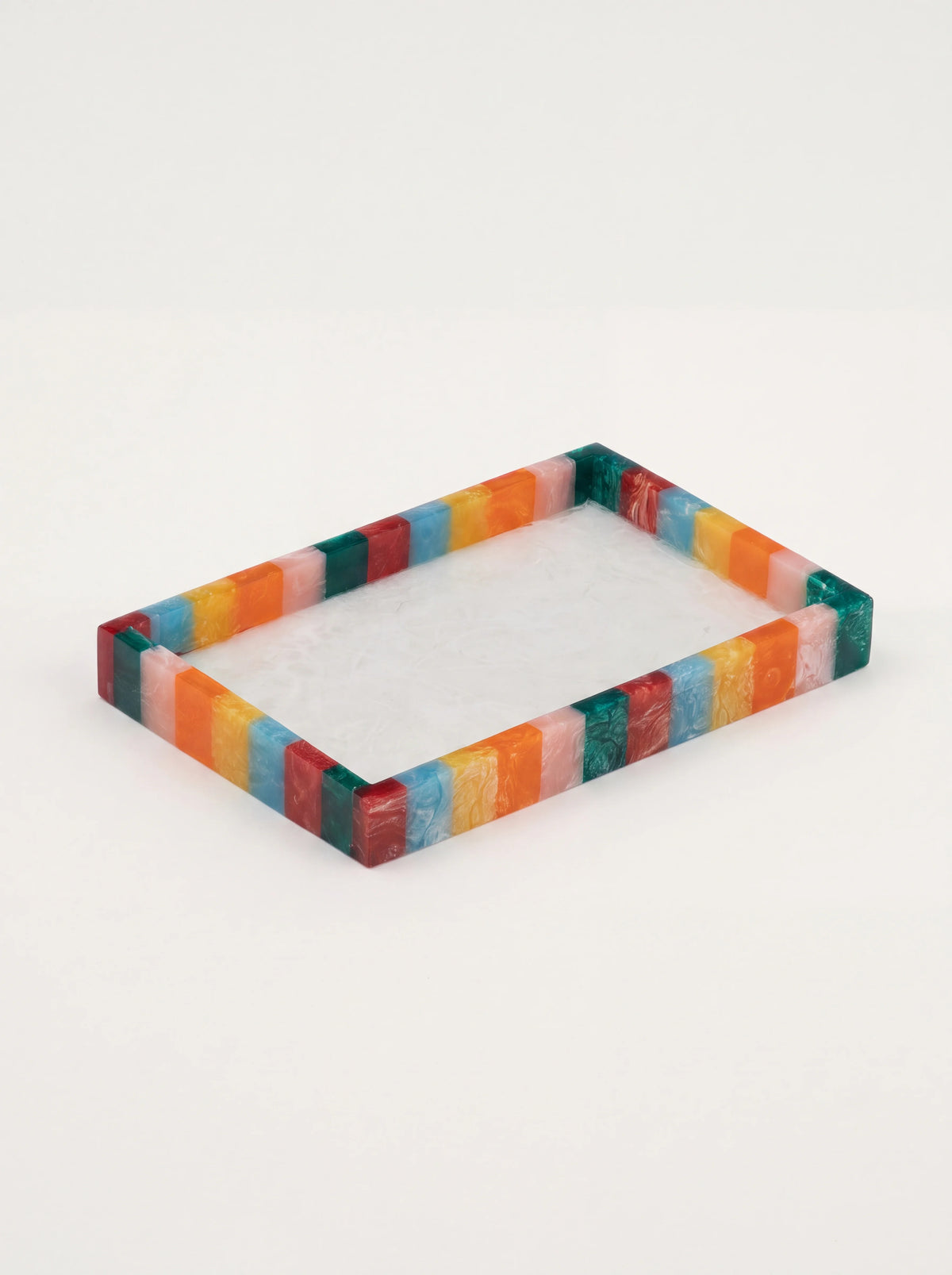Rectangular resin tray with a multicoloured block-striped rim and marbled white base