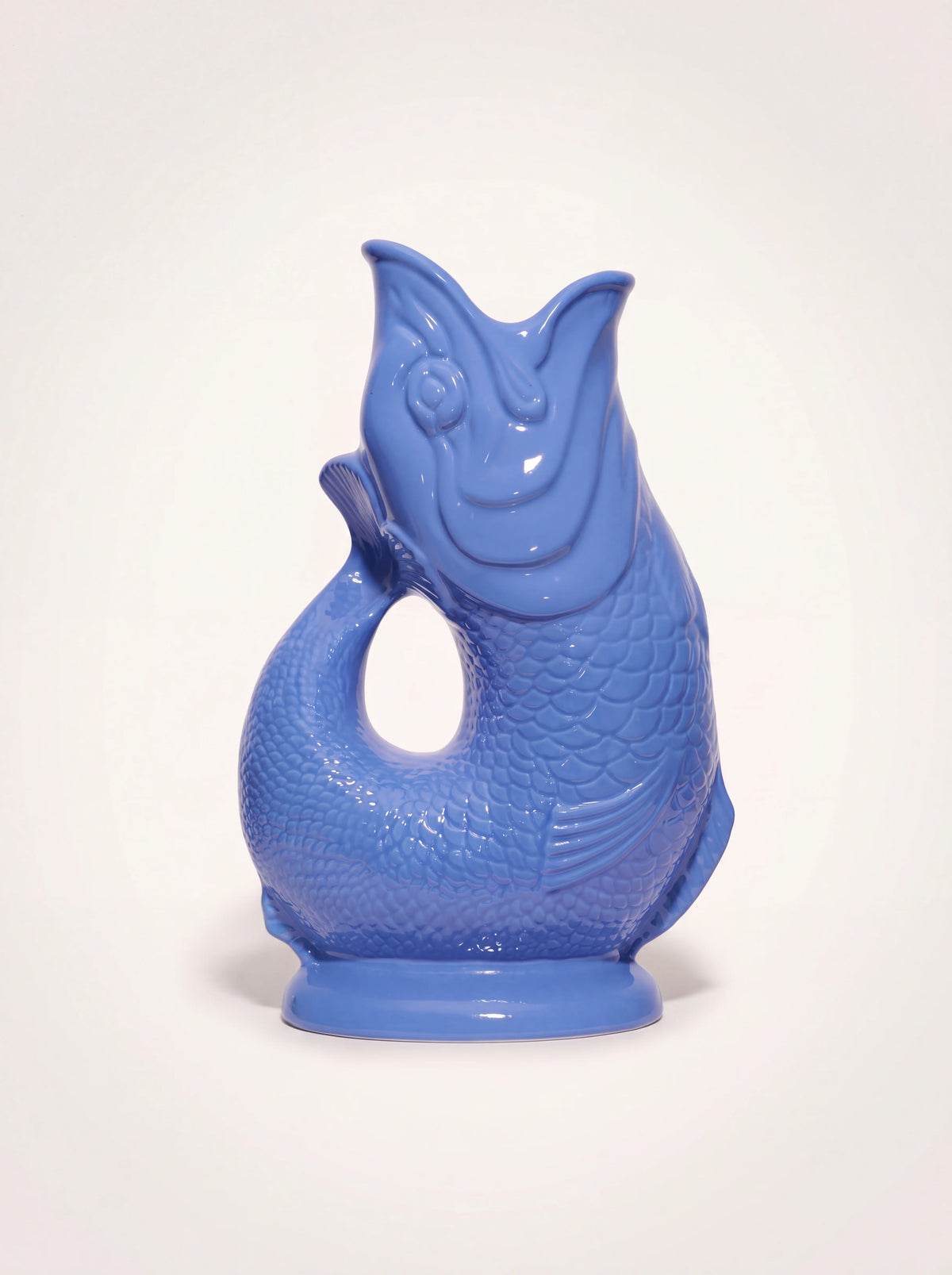 Fish-shaped sea blue glazed porcelain jug with an open-mouth spout and curved tail handle