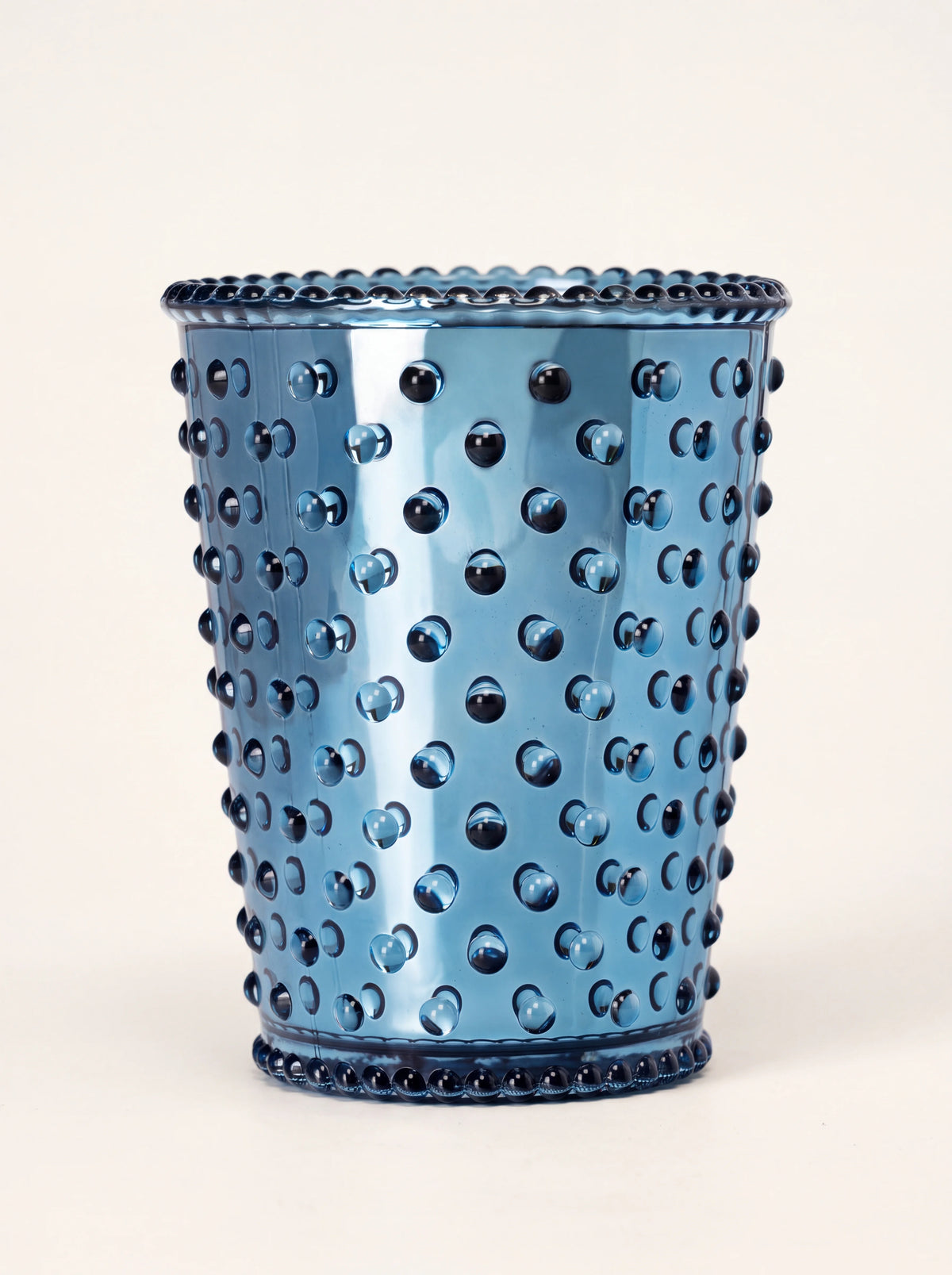 Blue electroplated hobnail glass candle vessel with raised studs and textured rims