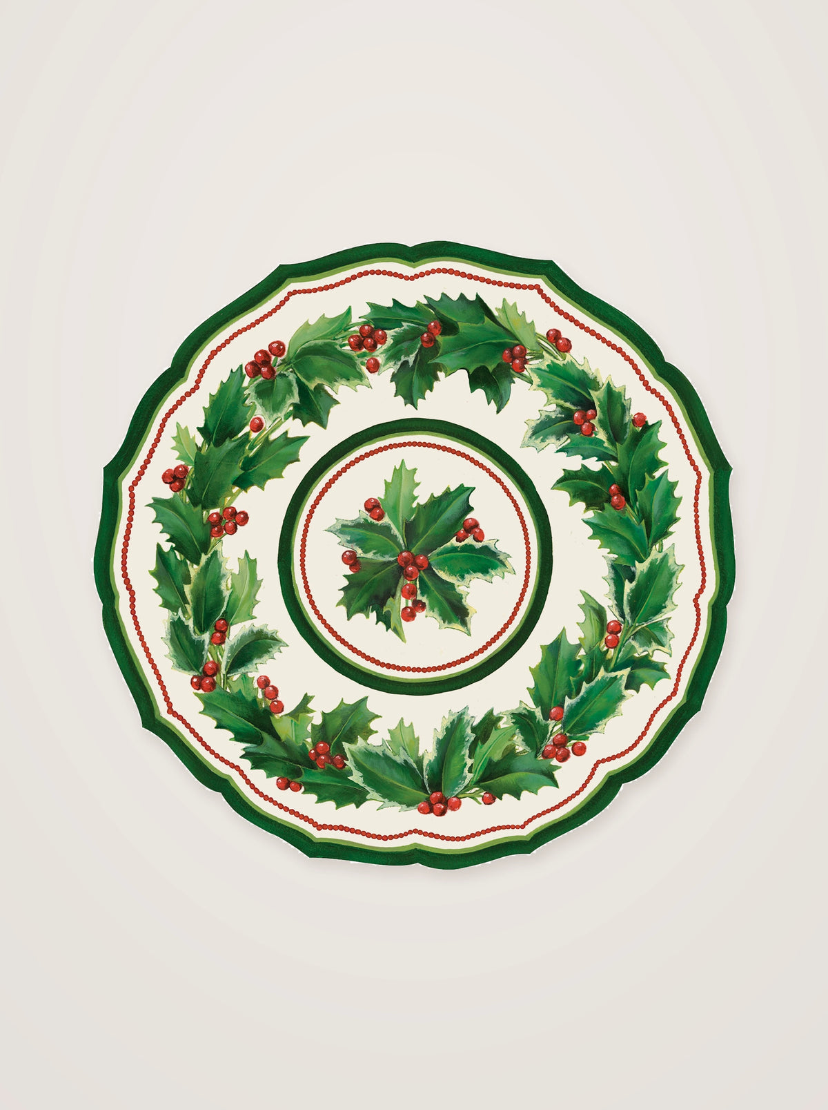 Round paper placemat with a die-cut scalloped edge, central holly sprig and encircling berry wreath