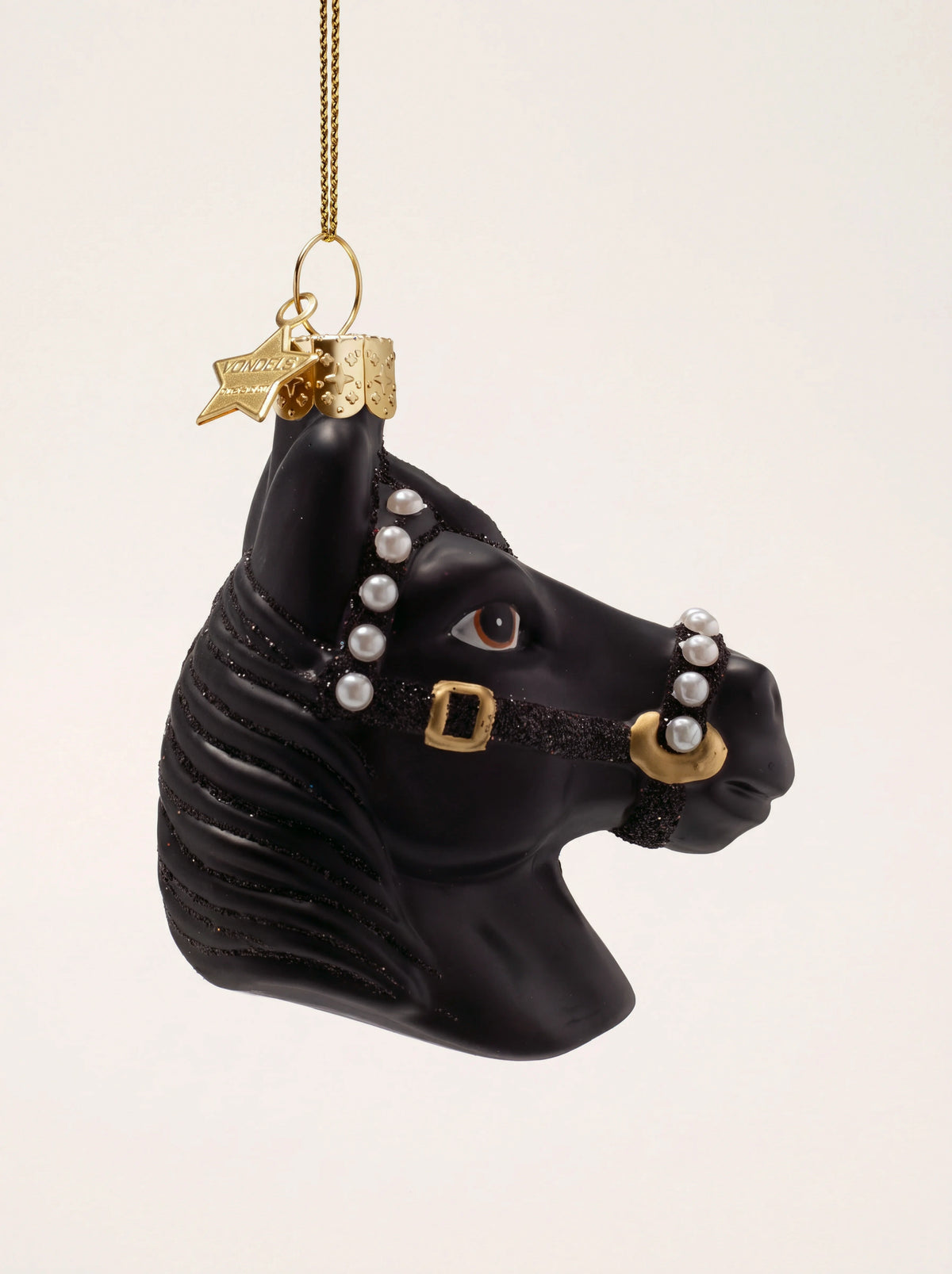 Black glass horse head ornament in profile, featuring a glitter halter with pearl accents and a gold hanger