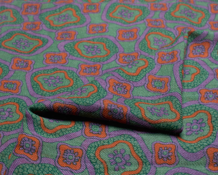 Close-up of the woven wool fabric folded over, showing the fine texture and print detail