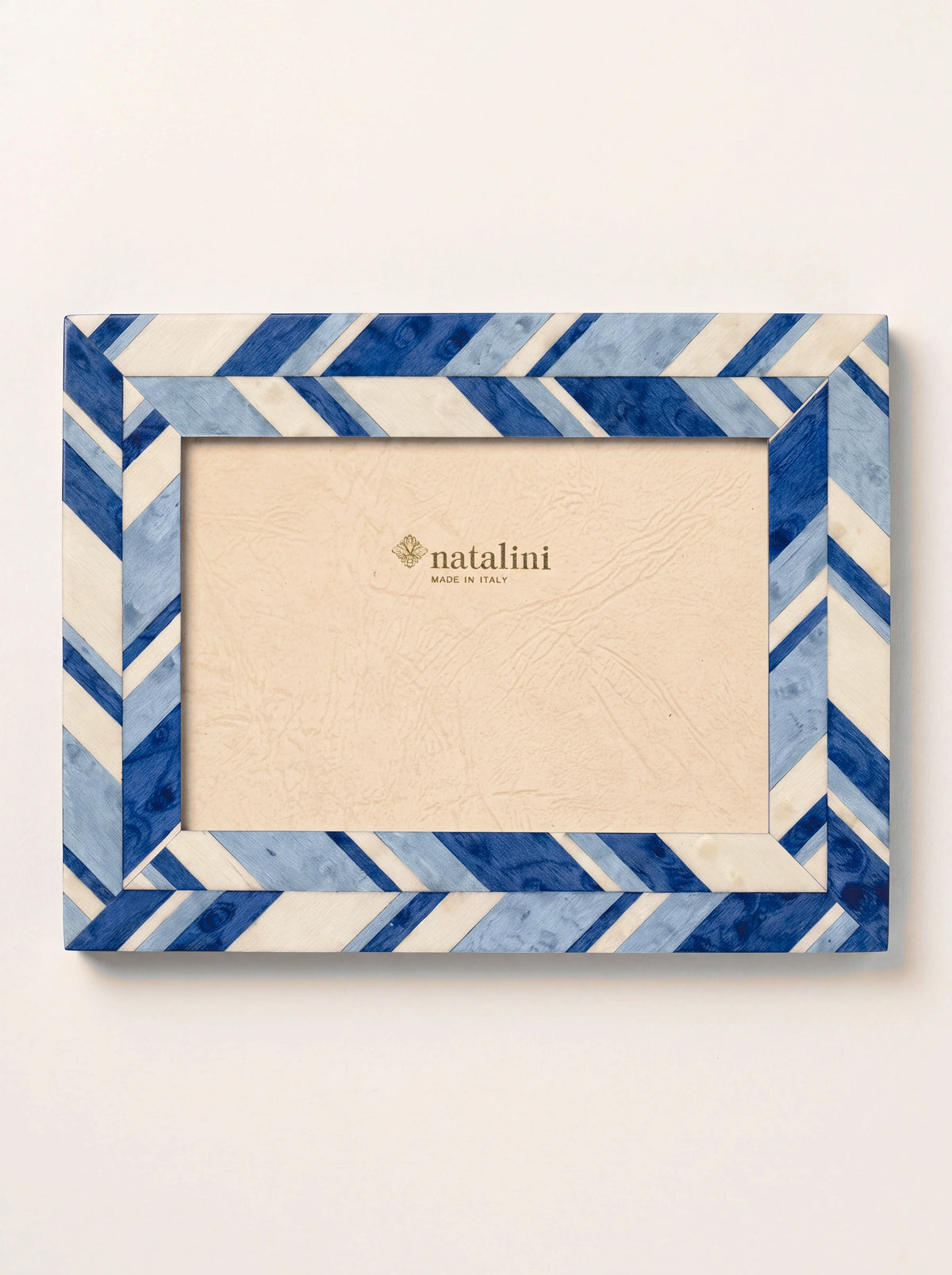 Wooden photo frame with blue and cream chevron inlaid veneer, insert reading natalini MADE IN ITALY