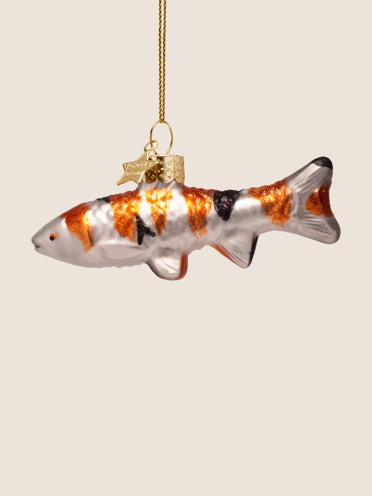 Reverse side of the koi carp ornament showing the hand-painted markings on the opposite flank