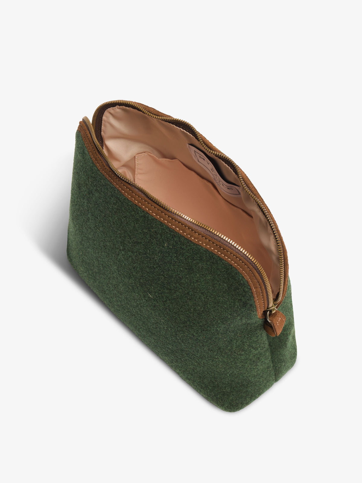 Green felt pouch unzipped from above, showing the light fabric lining and inner slip pocket