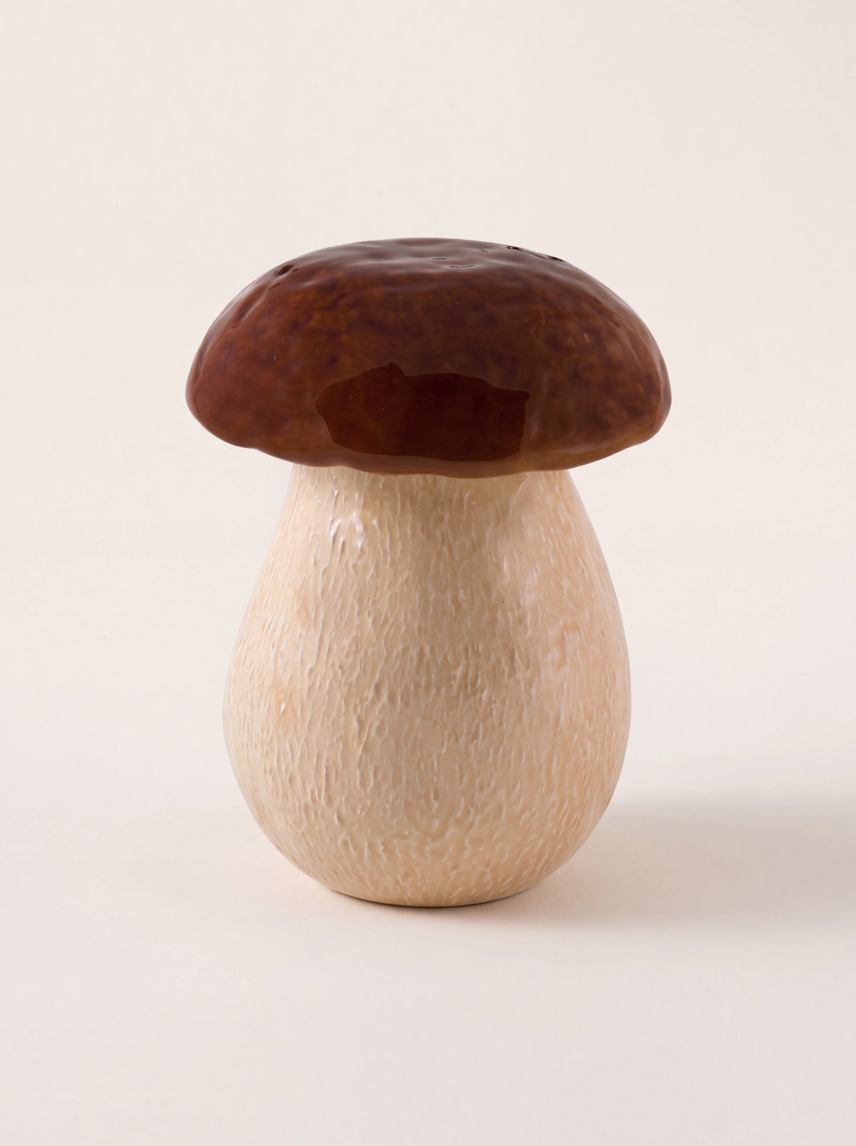 Mushroom-shaped earthenware box with a textured beige stalk base and glossy brown cap lid