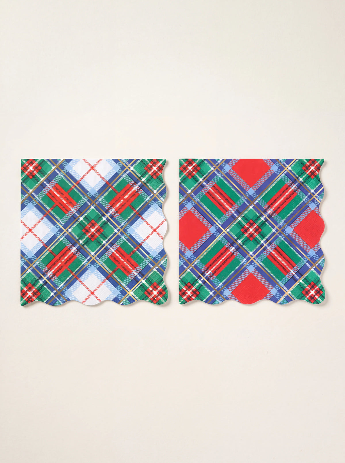 Tartan paper napkins with scalloped edges in two designs, showing gold foil lines with white and red accents