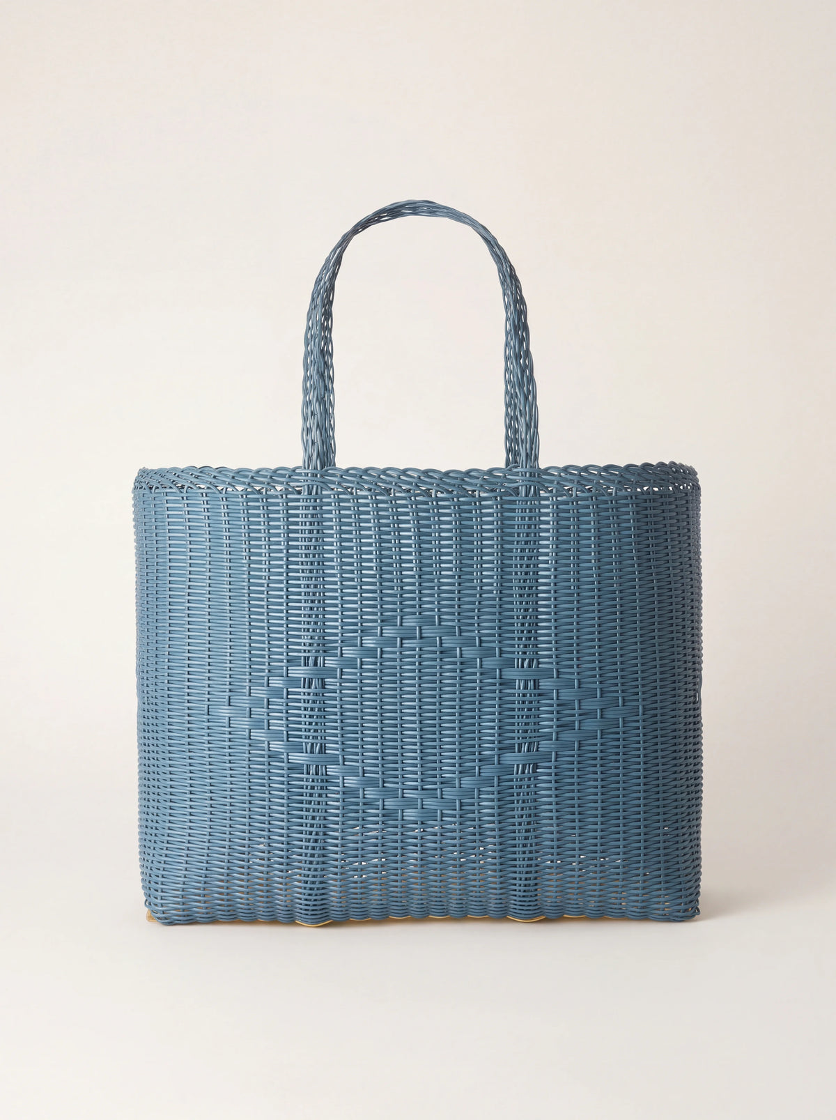 Large blue woven plastic tote bag with a tone-on-tone diamond pattern and two handles