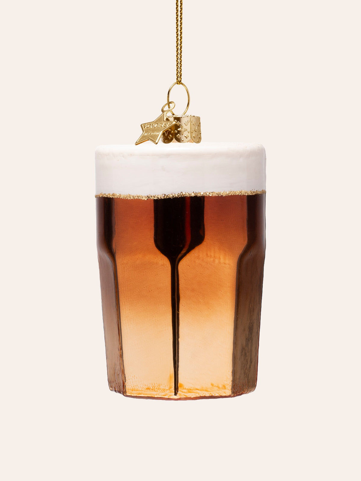 Reverse side showing the plain white froth top and shaded amber-to-brown glass body