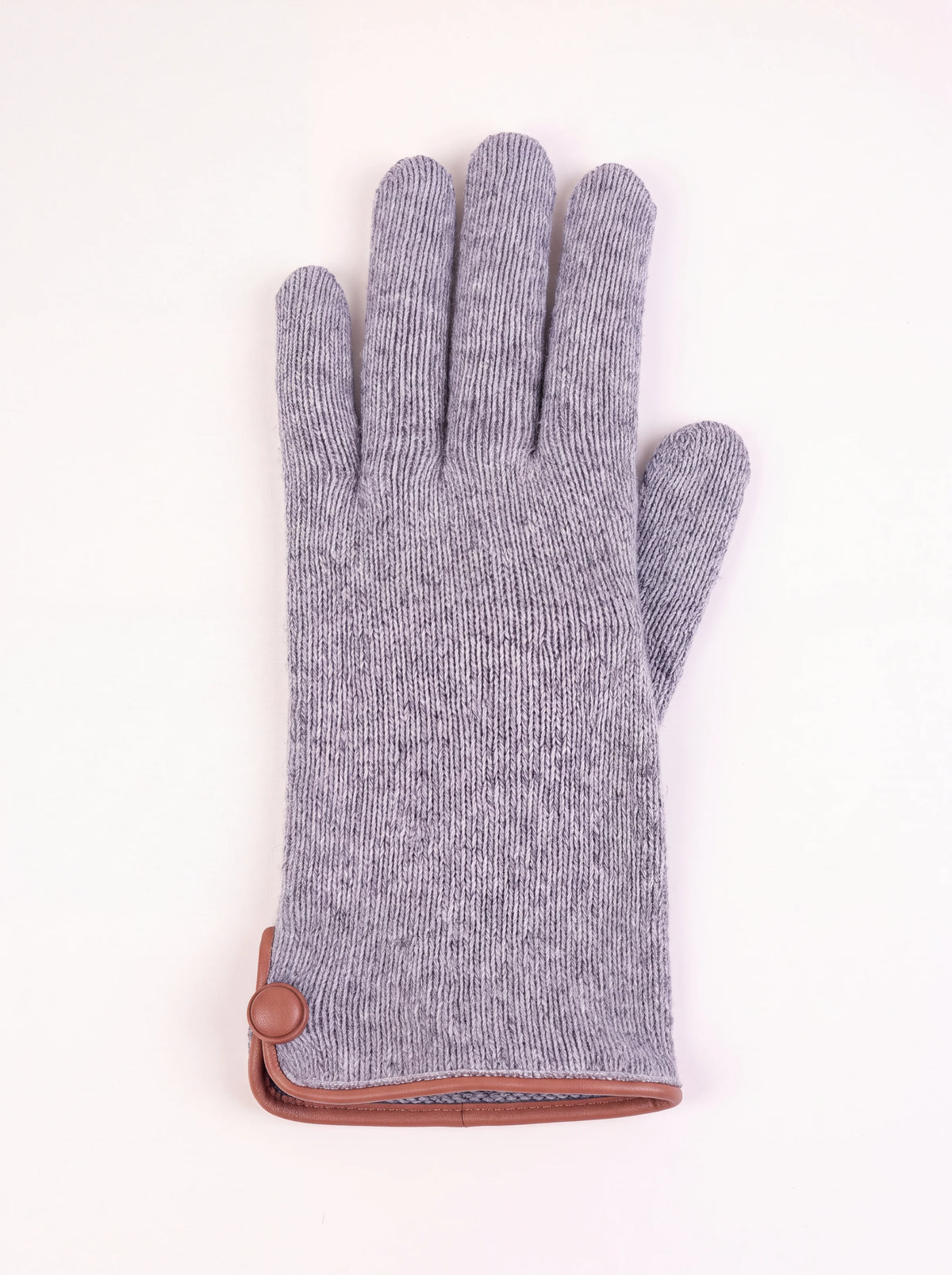 Grey knitted wool and cashmere glove with brown leather trim and covered button at the cuff