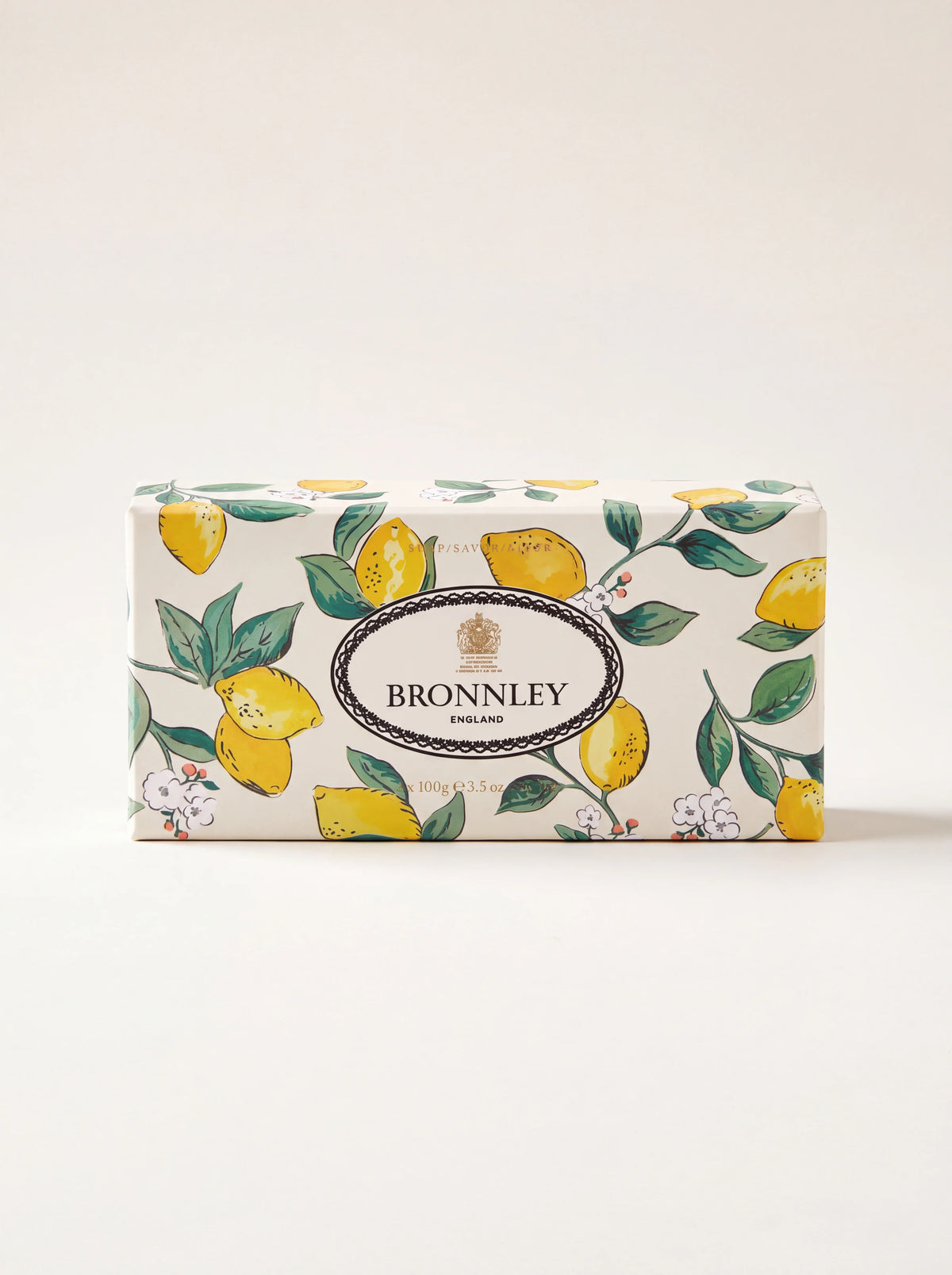 Pack of three lemon soap bars in paper packaging illustrated with lemons, labelled Bronnley England