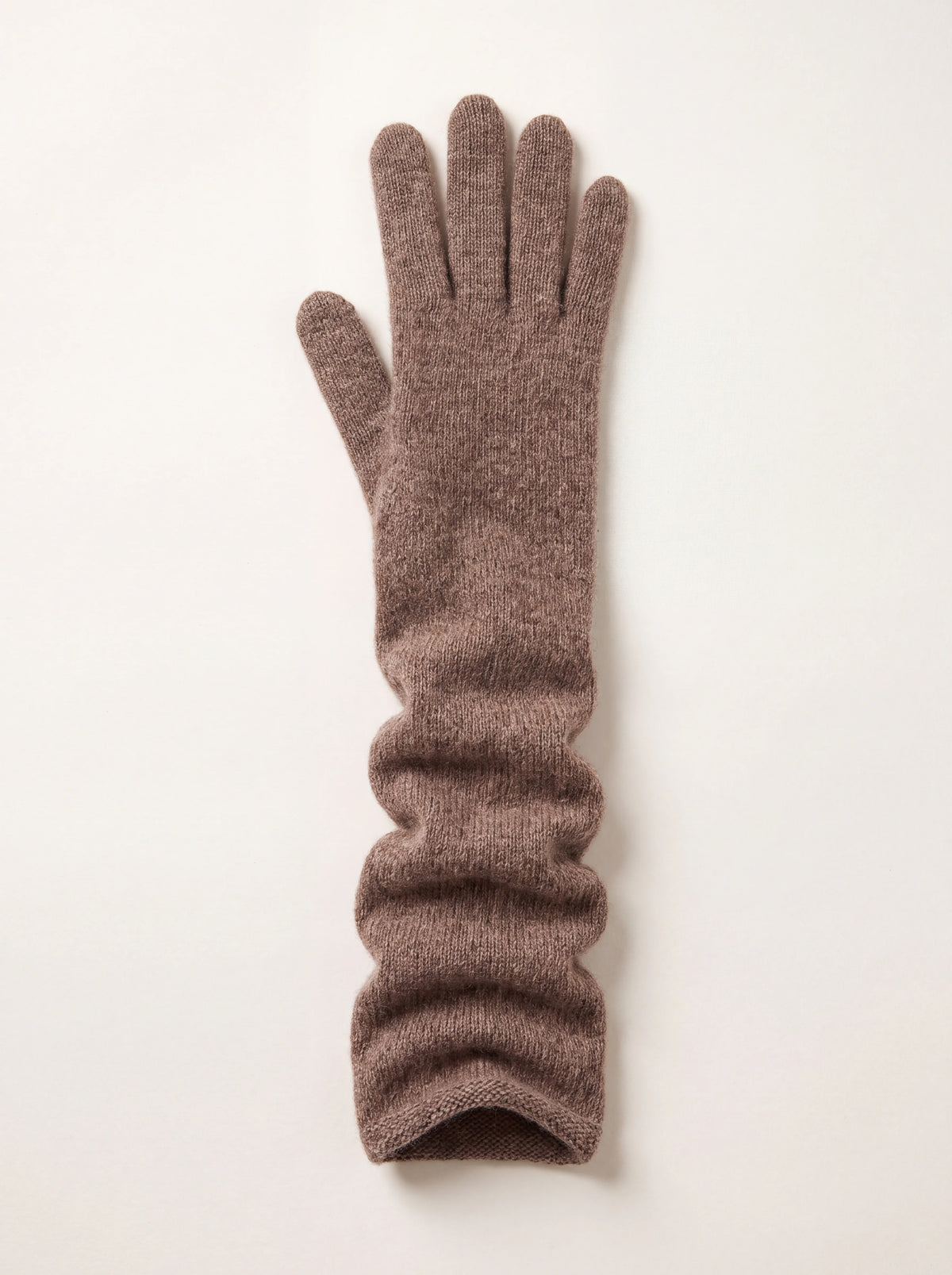 Long wool and cashmere glove in brown fine knit, shown gathered along the forearm