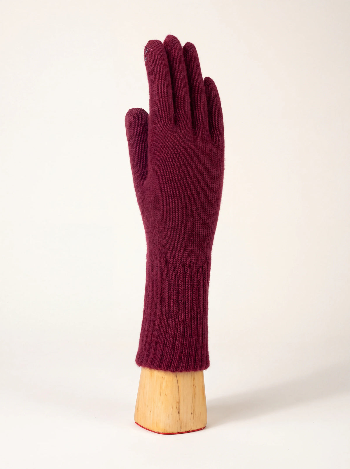 Long burgundy knitted wool and cashmere glove with an extended ribbed cuff