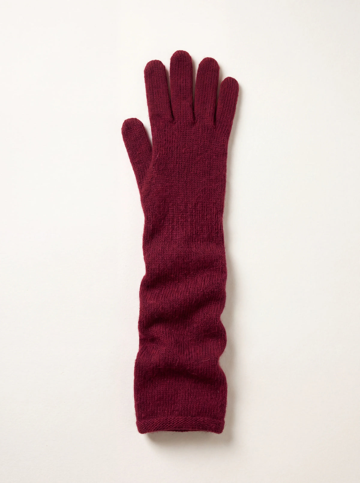 Long burgundy knitted wool and cashmere glove with full fingers and a rolled cuff