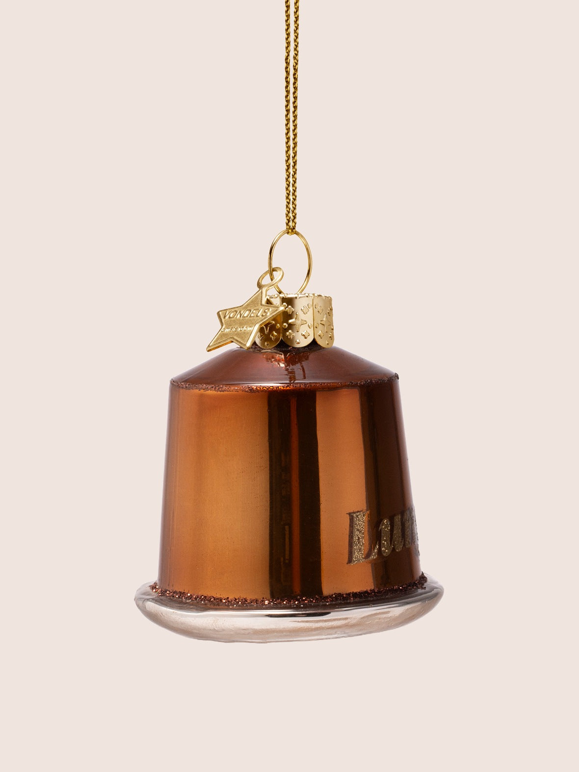 Side angle of the coffee capsule ornament showing the metallic sheen and star-shaped charm