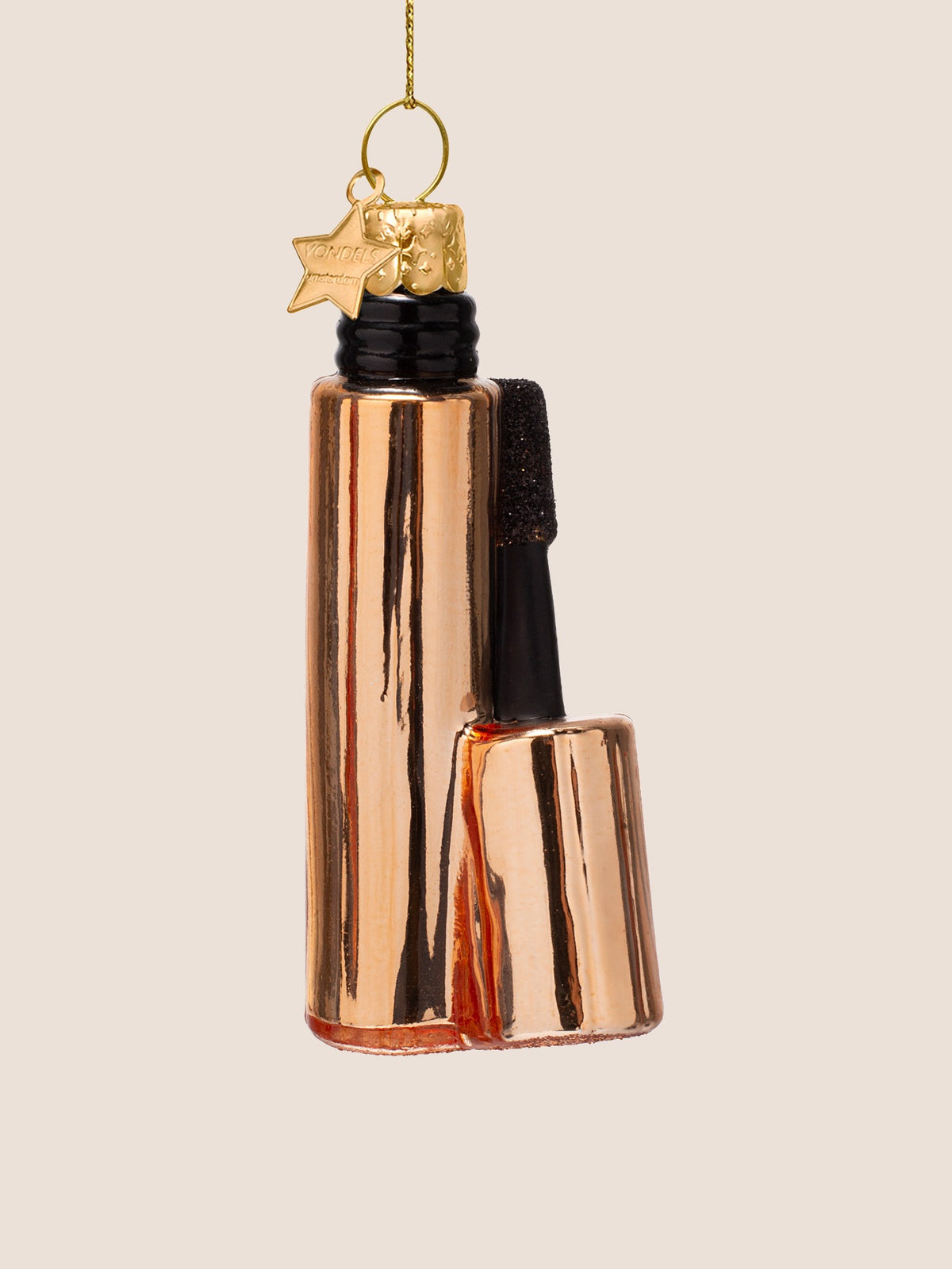 Side view of the copper mascara glass ornament showing the depth and attached wand design