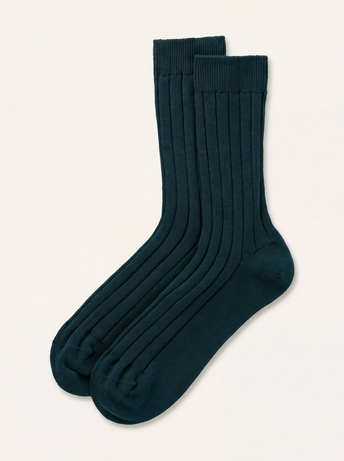 Bottle green ribbed cashmere socks laid flat, showing wide ribs and fine-knit cuffs