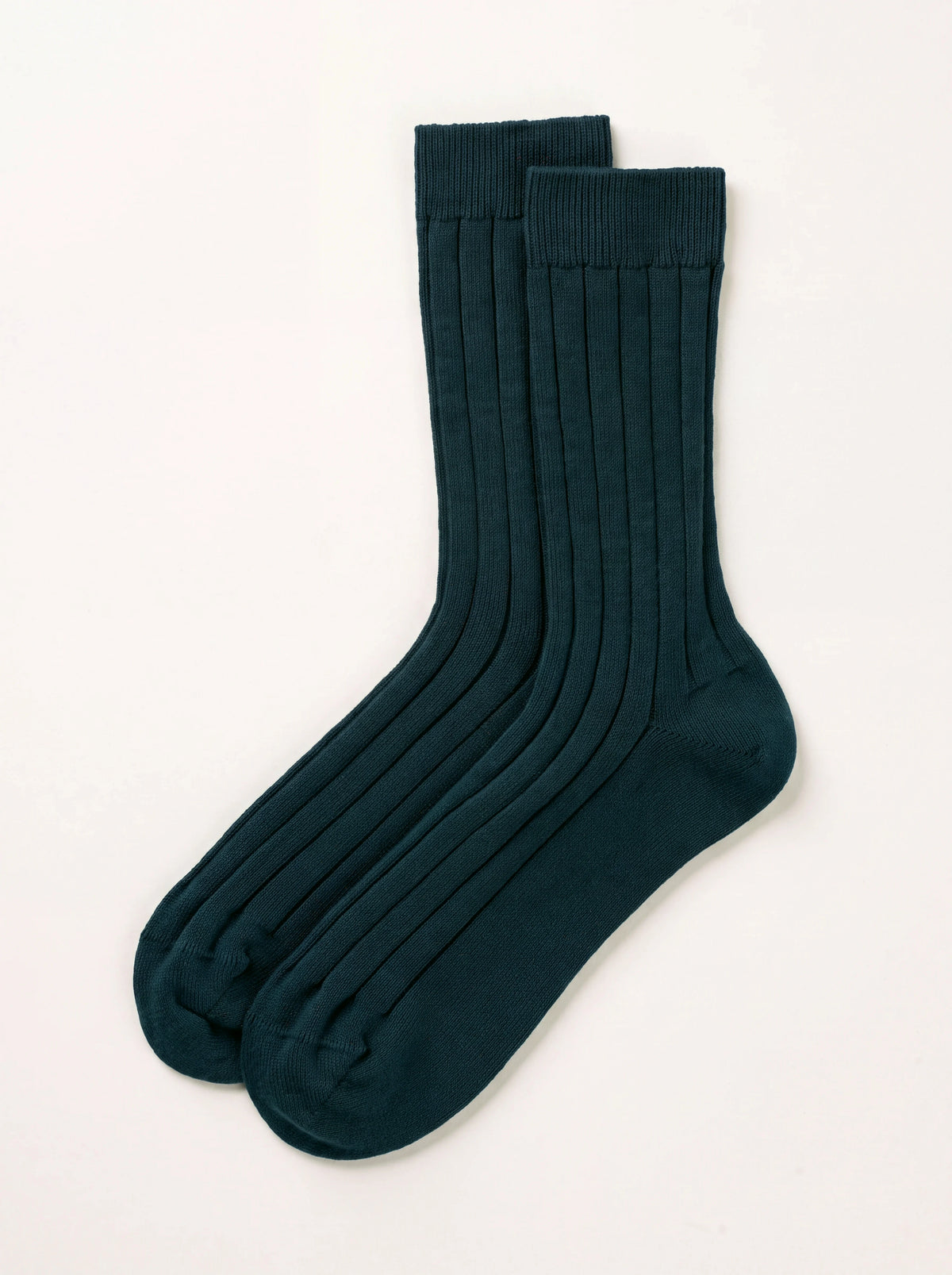 Bottle green ribbed cashmere socks laid flat, showing wide vertical ribs, smooth heel and toe