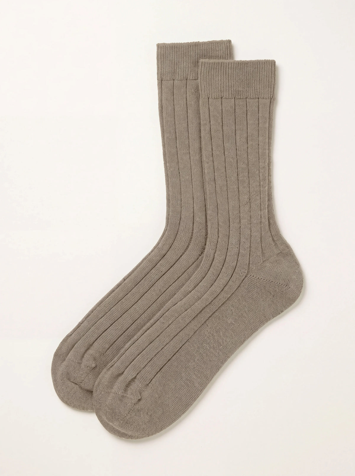 Pair of light brown ribbed cashmere socks with a ribbed cuff and smooth heel and toe