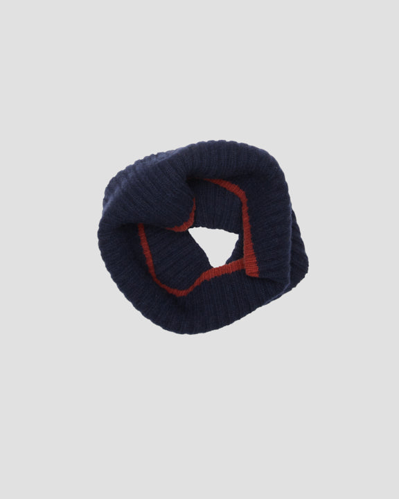 Tubular merino wool scarf gathered into a circular ring, viewed from above