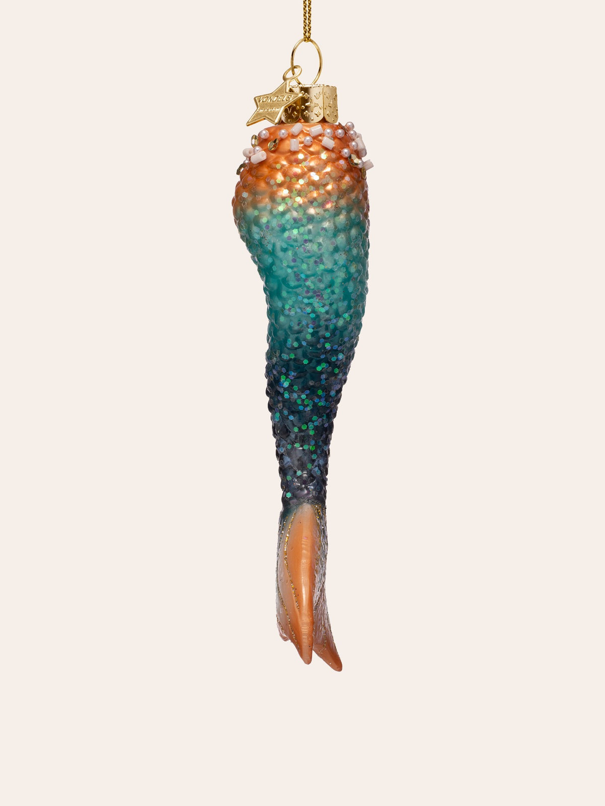 Side profile of the mermaid tail ornament showing its slender shape and curved fin edge