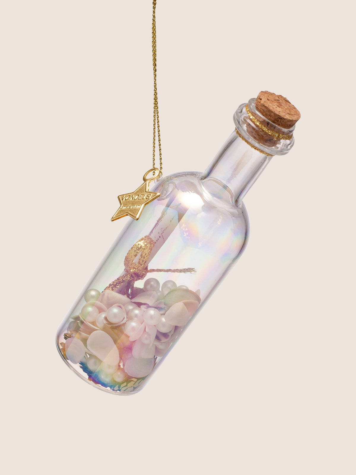 Alternate view highlighting the rainbow sheen across the curved glass and the pastel shells inside