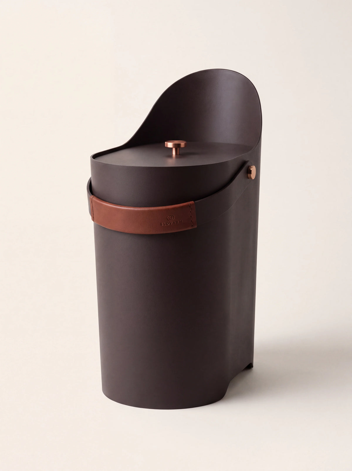 Dark brown steel ash bucket with a raised curved back, fitted lid with brass knob and leather handle