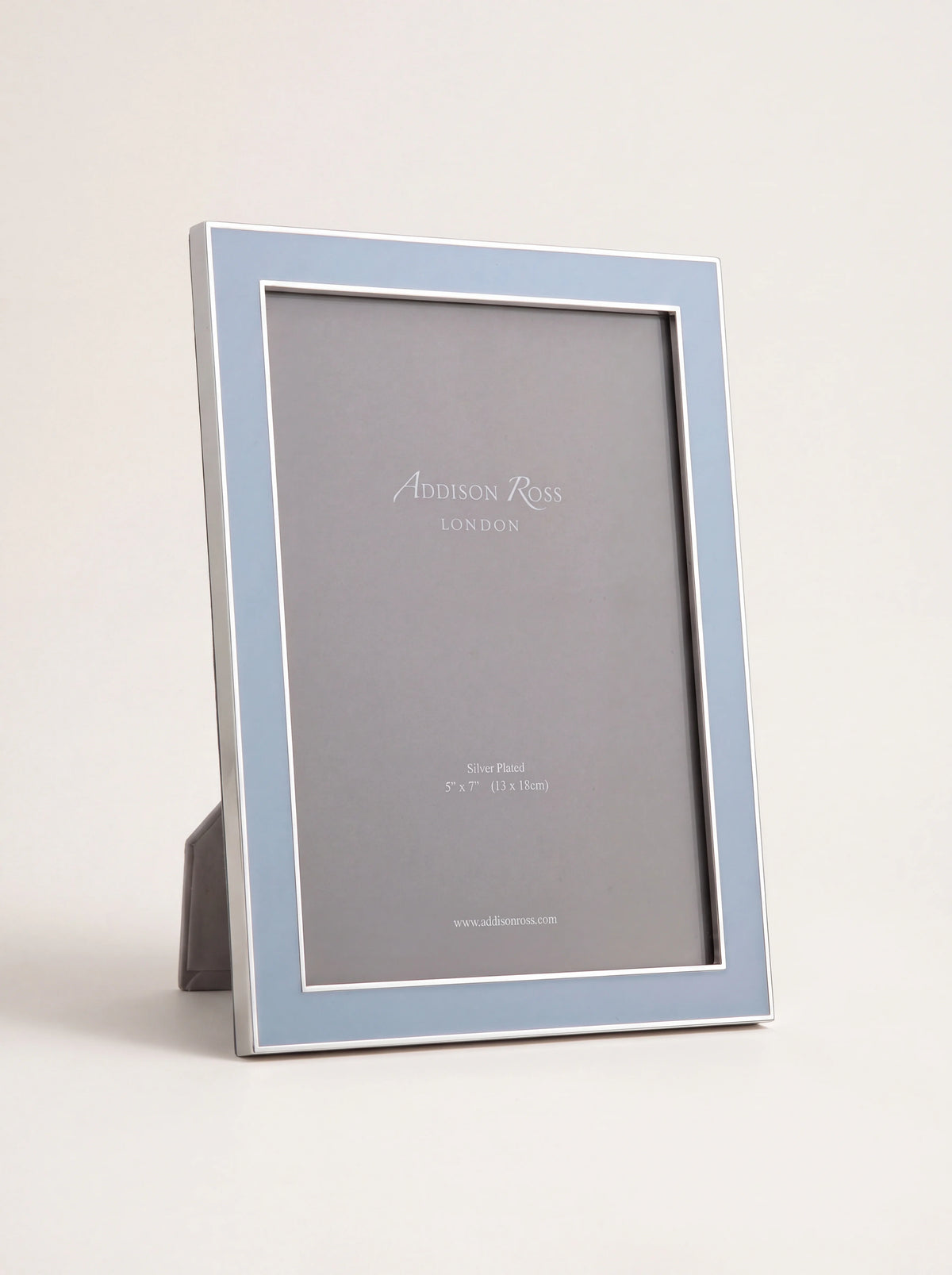 Powder blue enamelled photo frame with a silver-plated border, standing in portrait orientation
