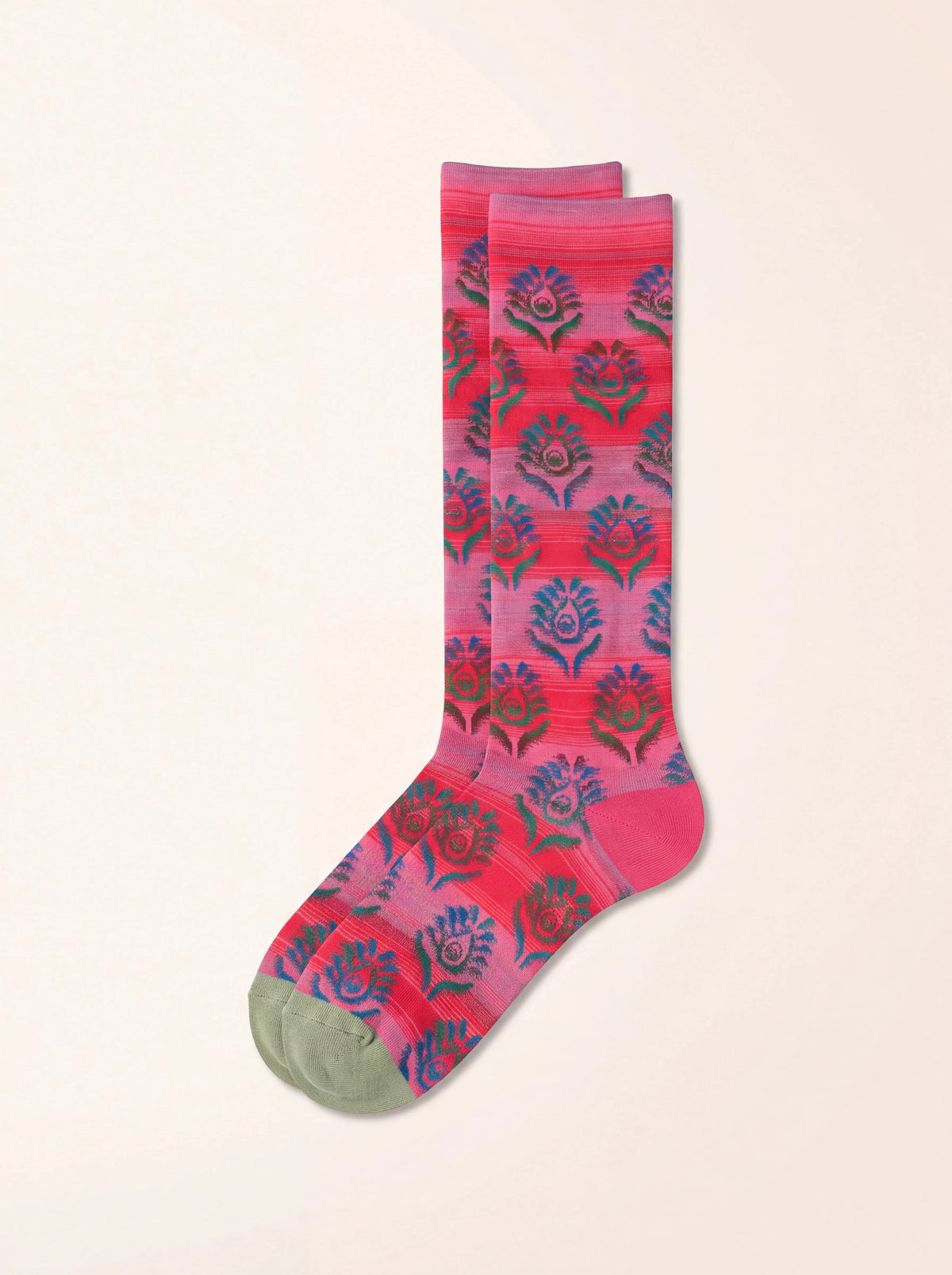 Pink and red cotton knee-high socks with a striped floral pattern, pink heels, and green toes