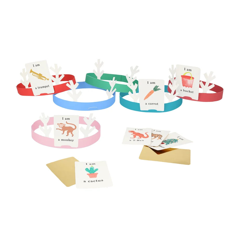 Paper antler headbands in assorted colours with illustrated guessing cards and a gold envelope