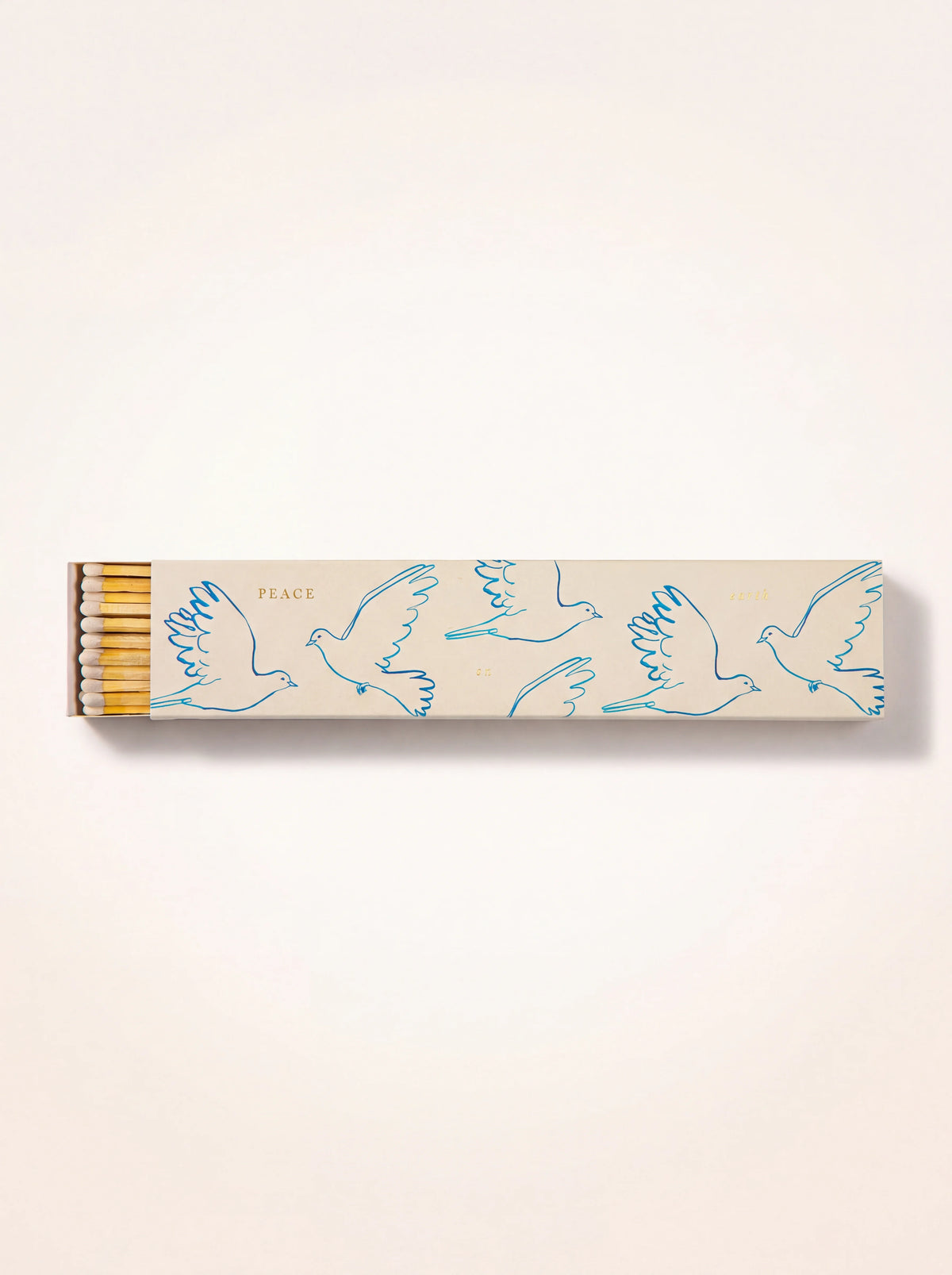 Long matchbox with blue dove illustrations and 'PEACE on earth', open at one end showing wooden matches