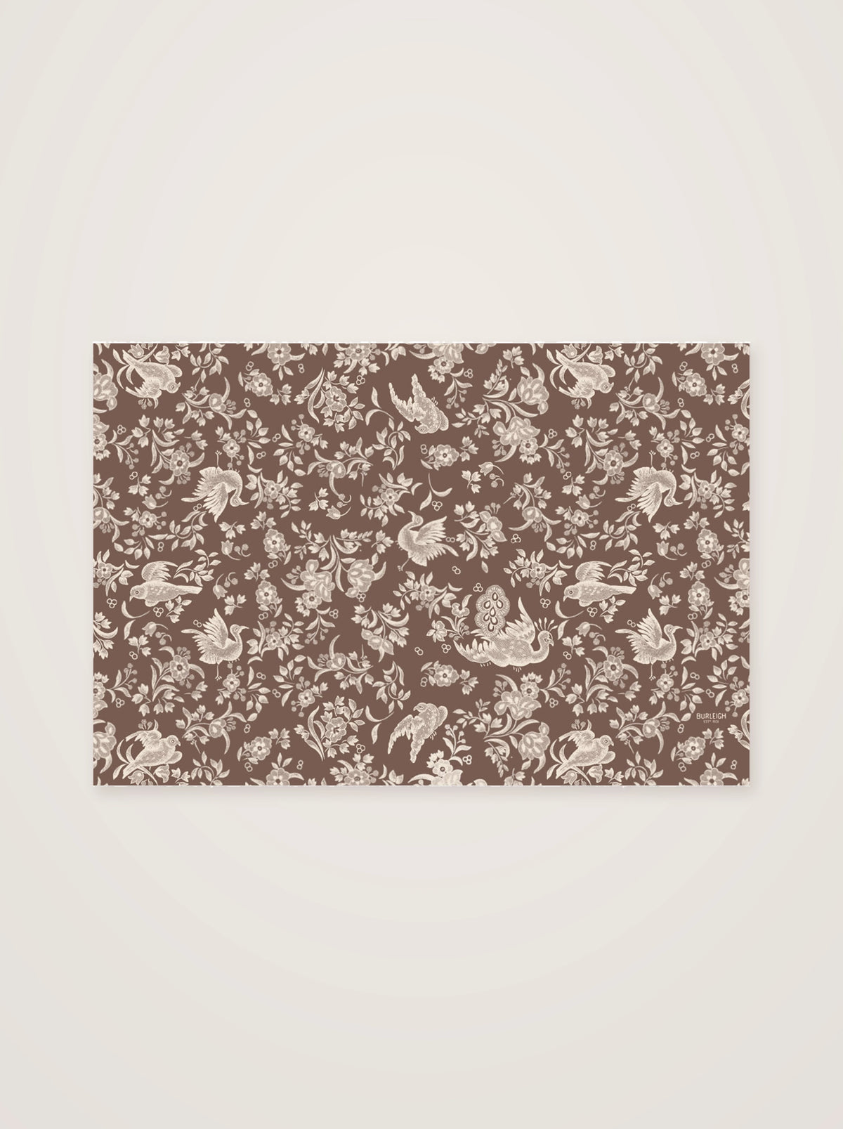 Paper placemat pad of 18 tear-off sheets with a brown and cream peacock pattern