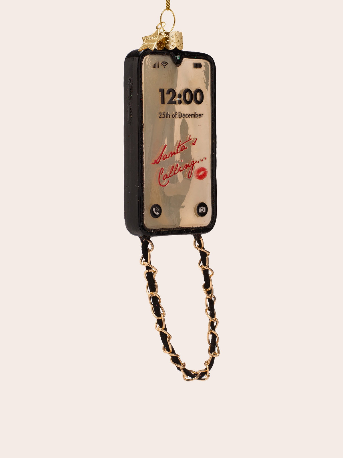 Three-quarter view showing the black casing edge, hanging loop with star charm and dangling chain