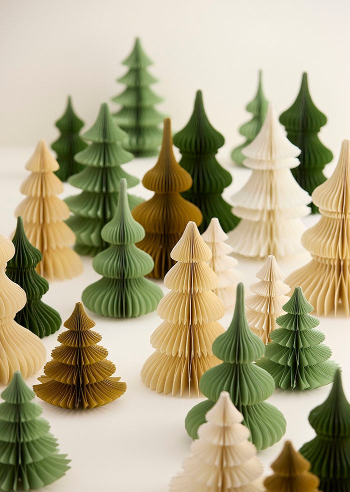 Collection of paper honeycomb trees in assorted heights, shapes and earthy tones