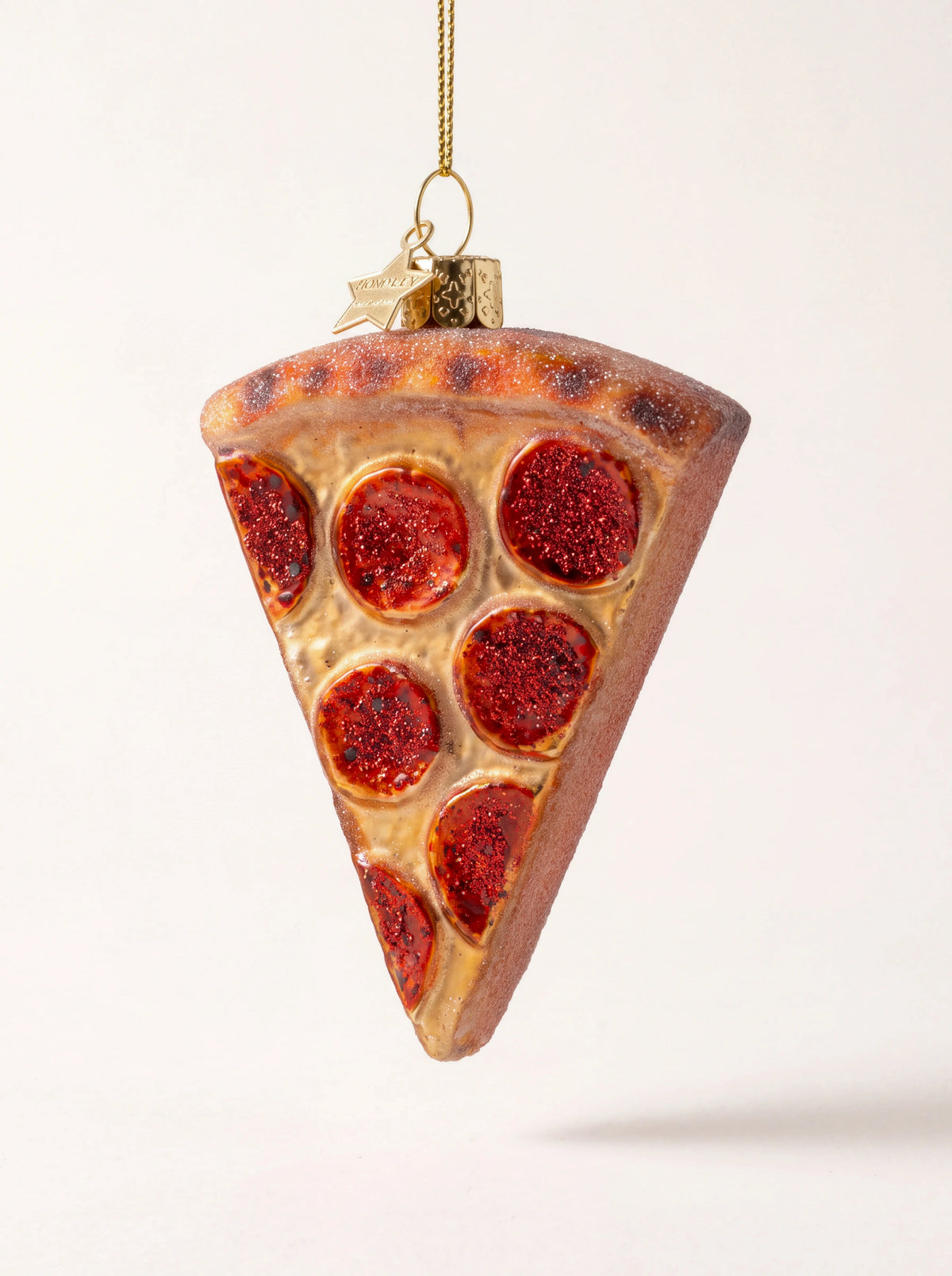 Glass pizza slice Christmas ornament with red glitter pepperoni and gold hanging loop