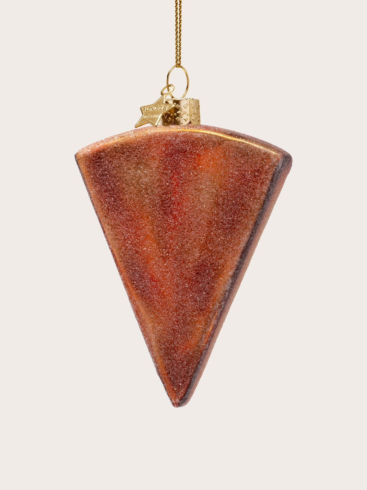 Reverse side of the glass pizza slice ornament showing the frosted golden-brown crust
