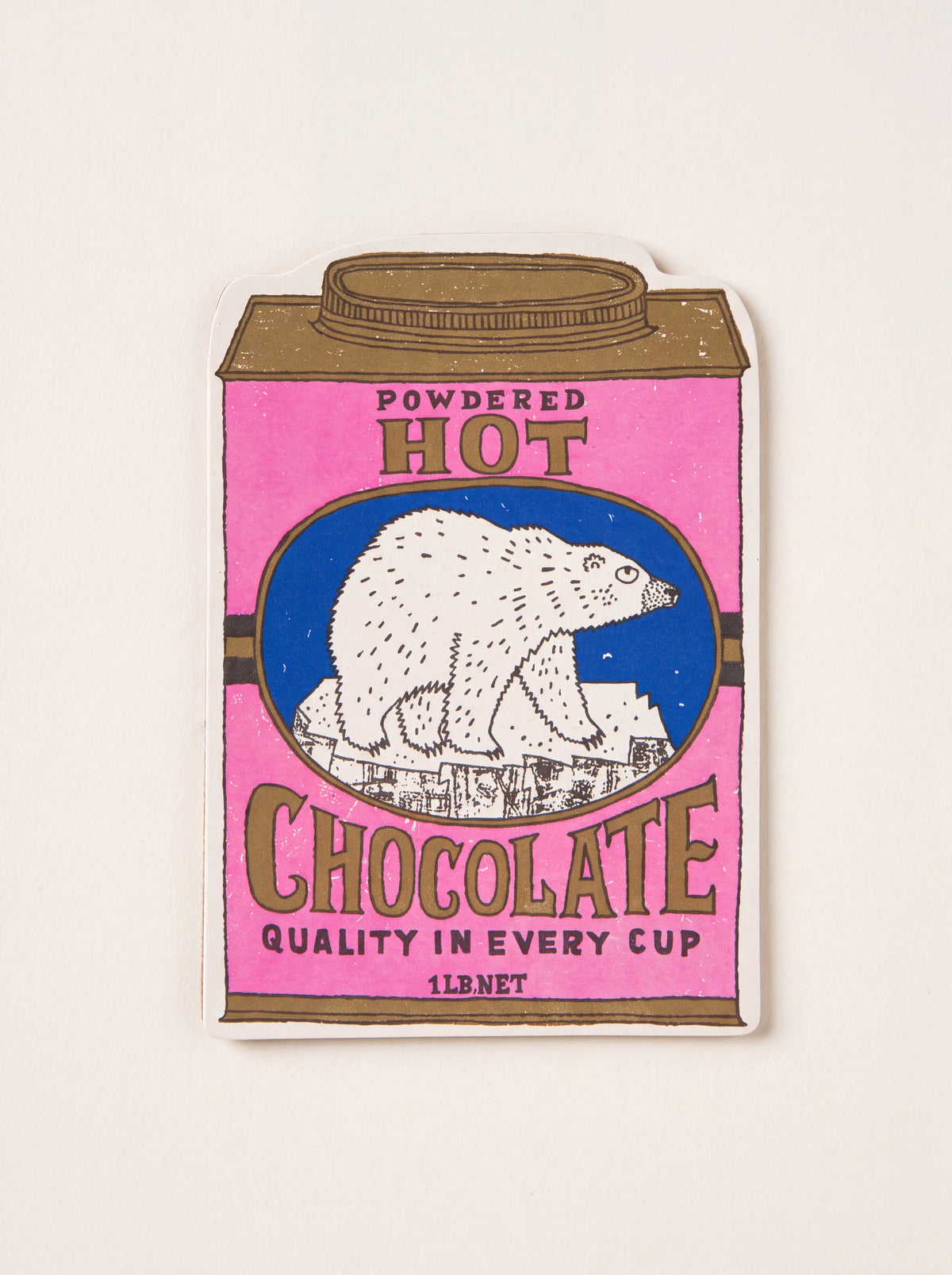 Cut-out card shaped like a pink hot chocolate tin with a polar bear and text reading Powdered Hot Chocolate