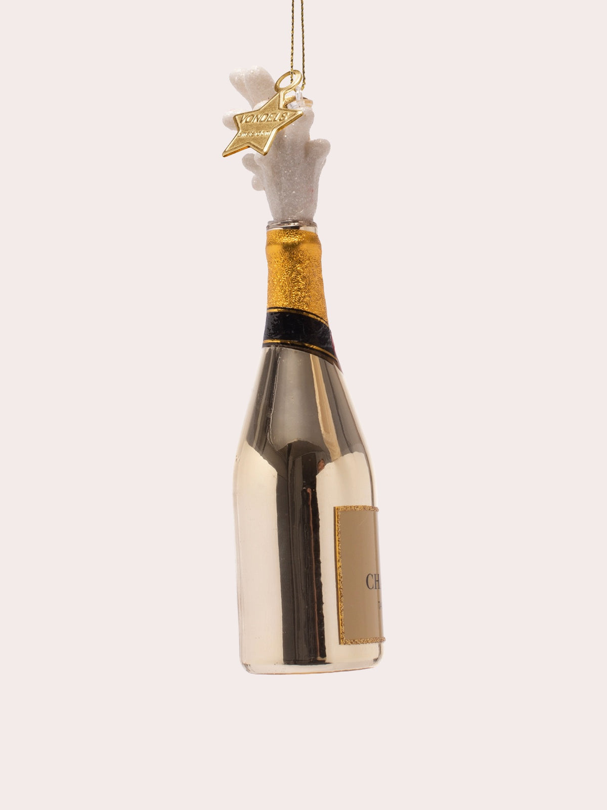 Profile view of the glass ornament showing the reflective cylindrical body and star hanging charm