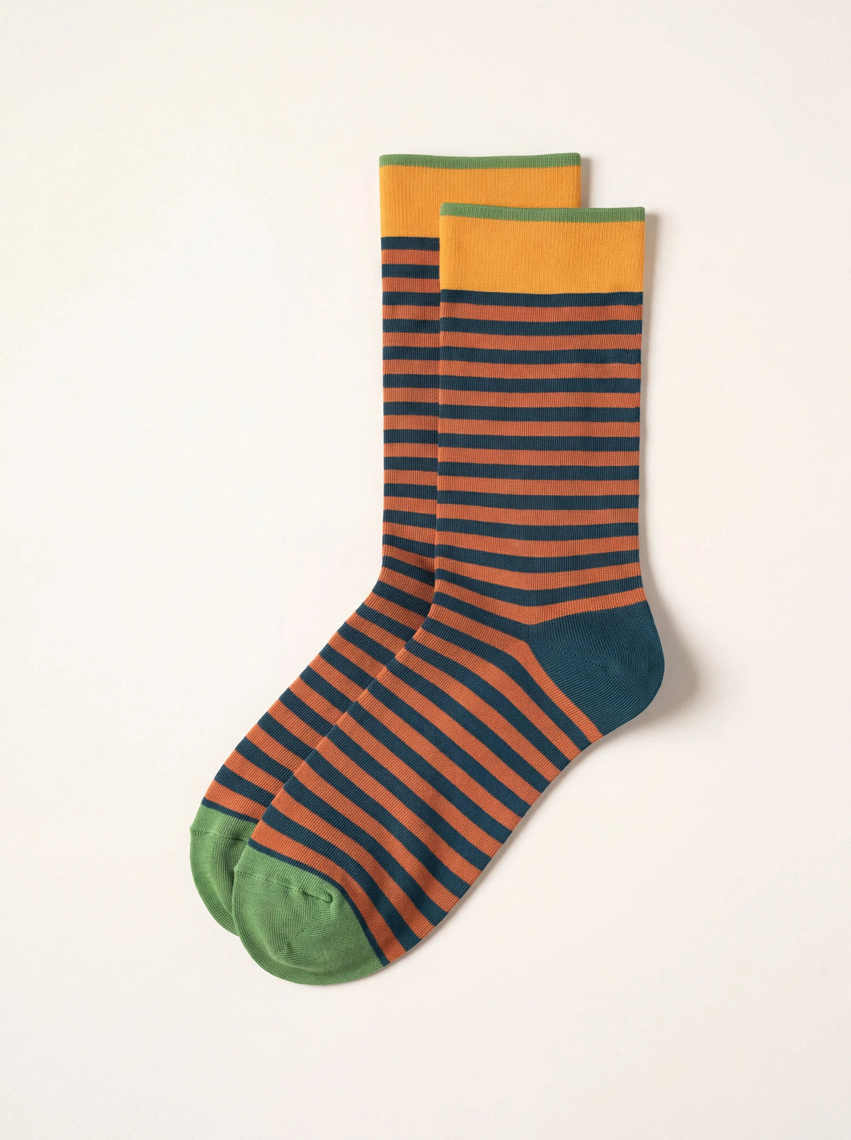 Striped cotton-blend socks with rust and navy stripes, yellow ribbed cuffs, teal heels and green toes