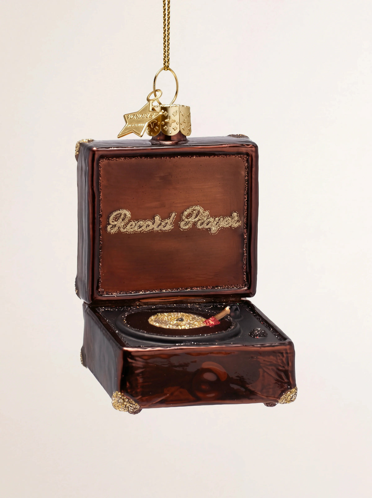 Brown glass record player ornament with open lid reading "Record Player" in gold glitter