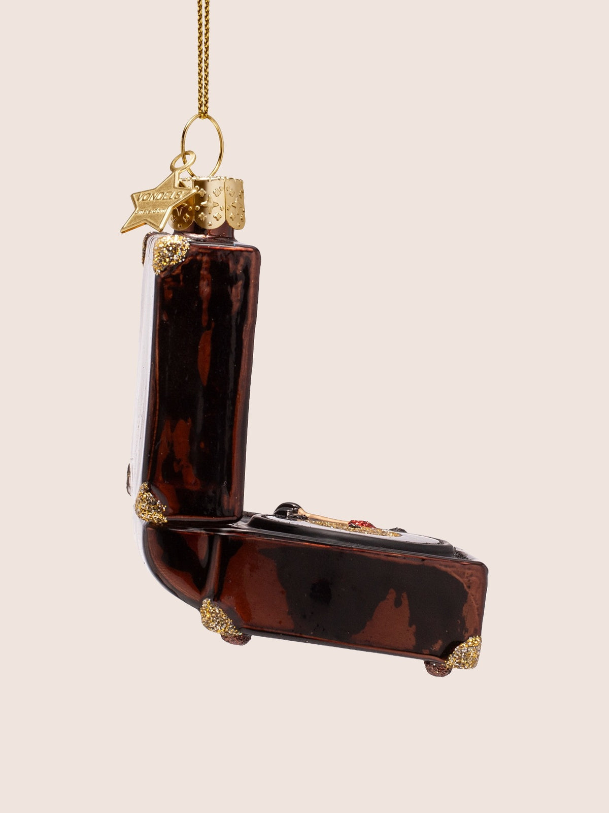 Side profile of the record player ornament showing the upright lid and small feet