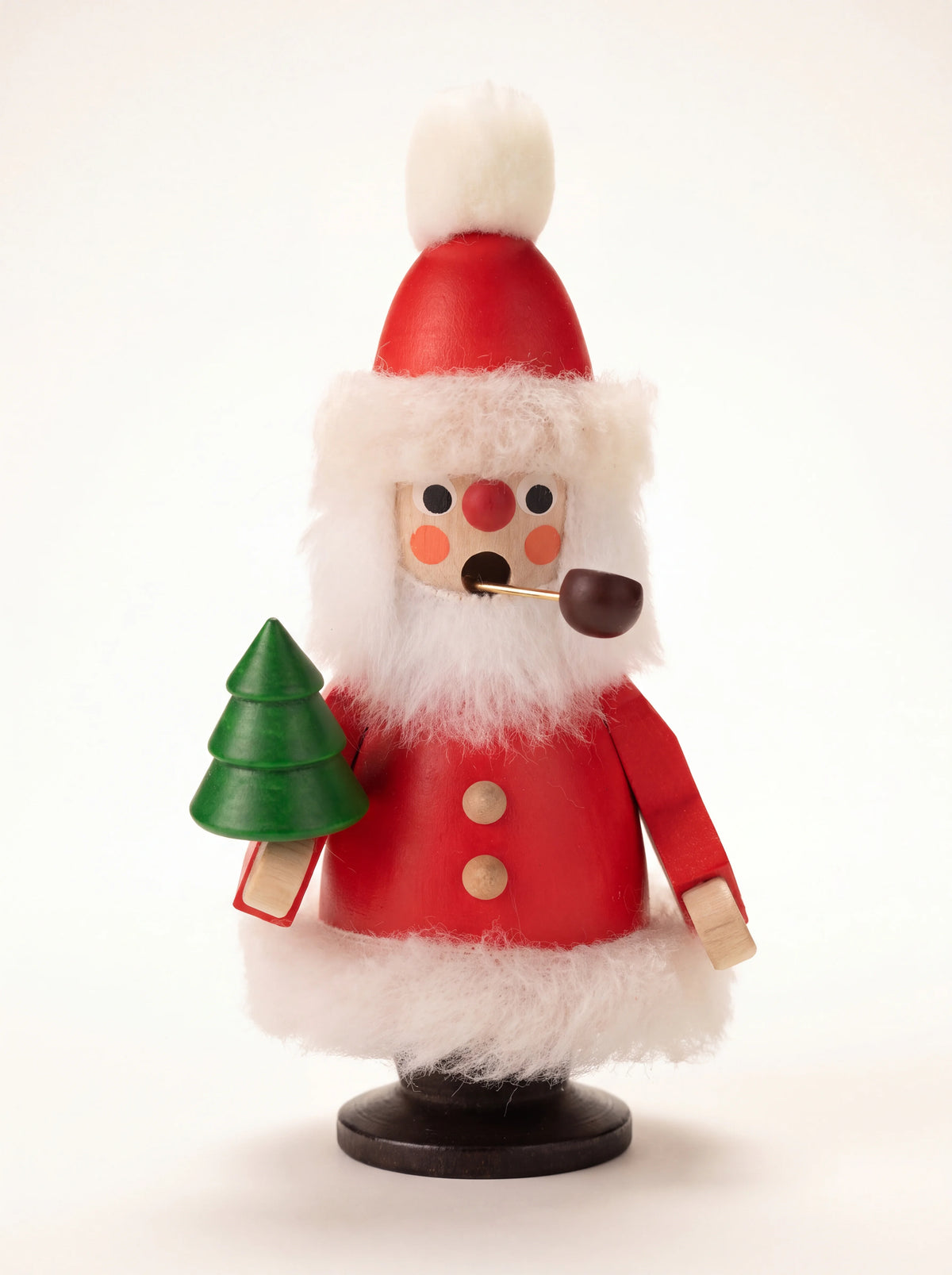 Wooden Santa Claus incense smoker in a red coat with fluffy white trim, smoking a pipe and holding a green tree