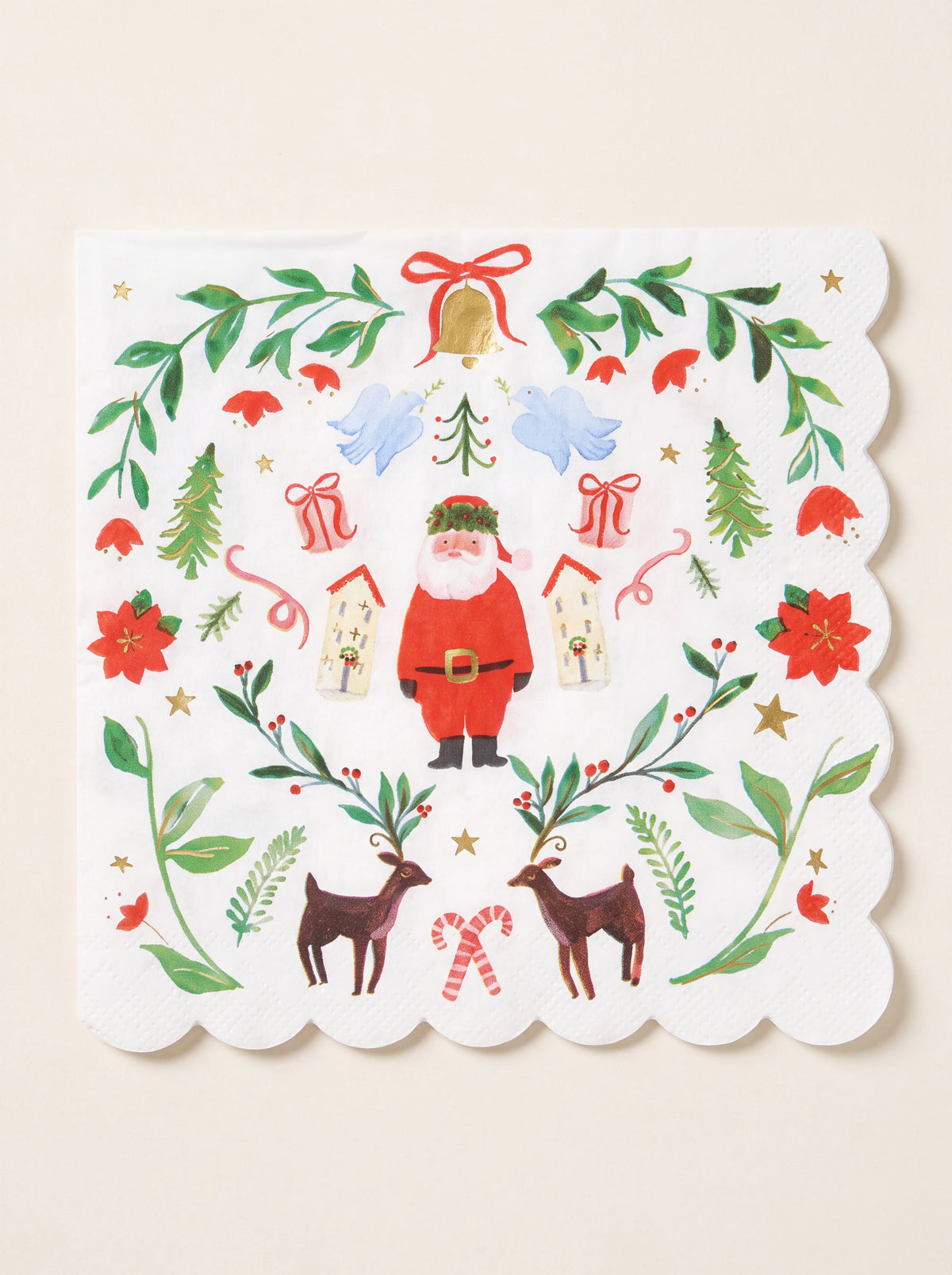 White paper napkin with scalloped edges, featuring Santa Claus, reindeer, festive foliage and gold foil details