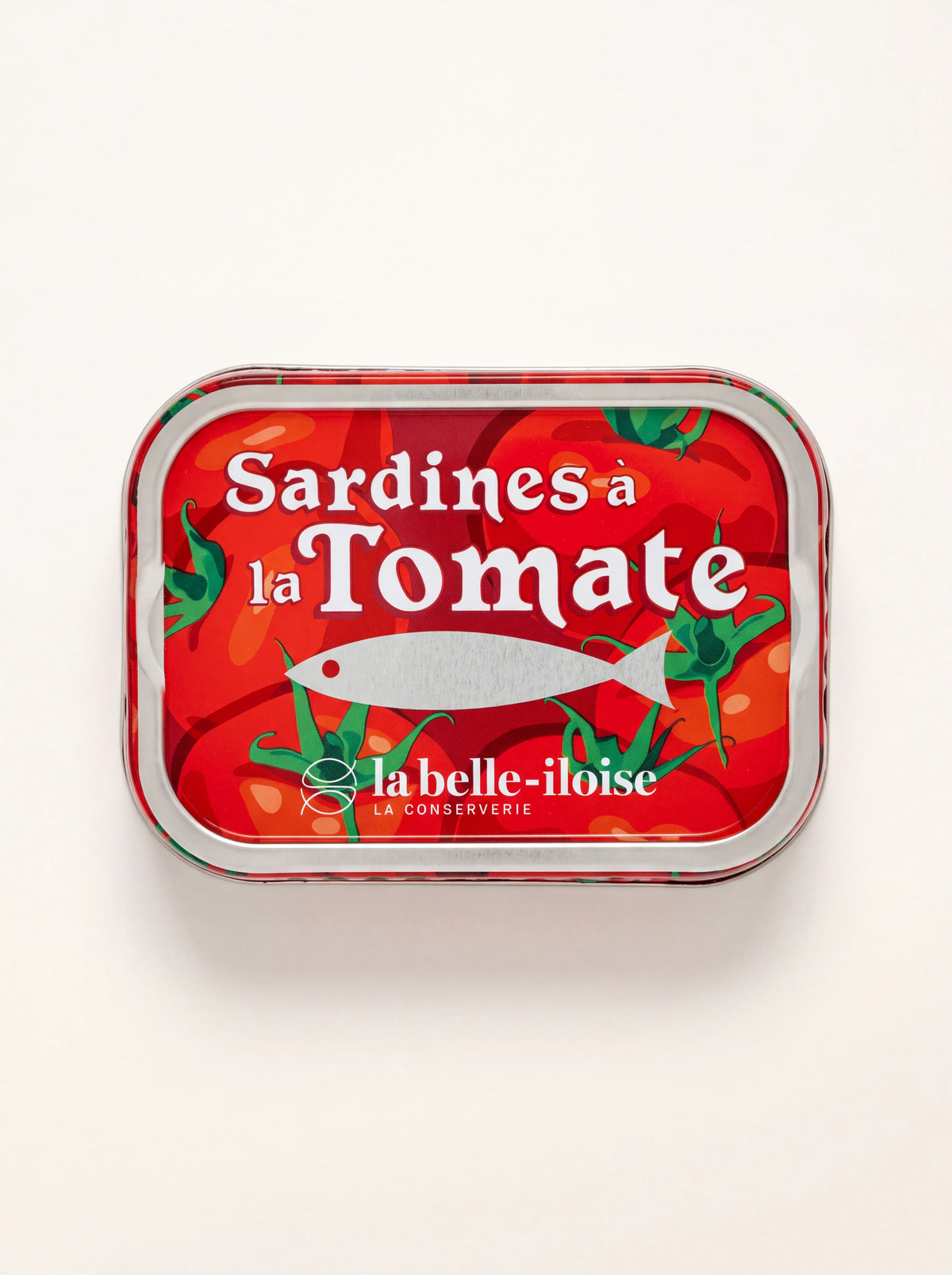 Rectangular tin of sardines in tomato sauce with red tomato graphics and text reading Sardines à la Tomate