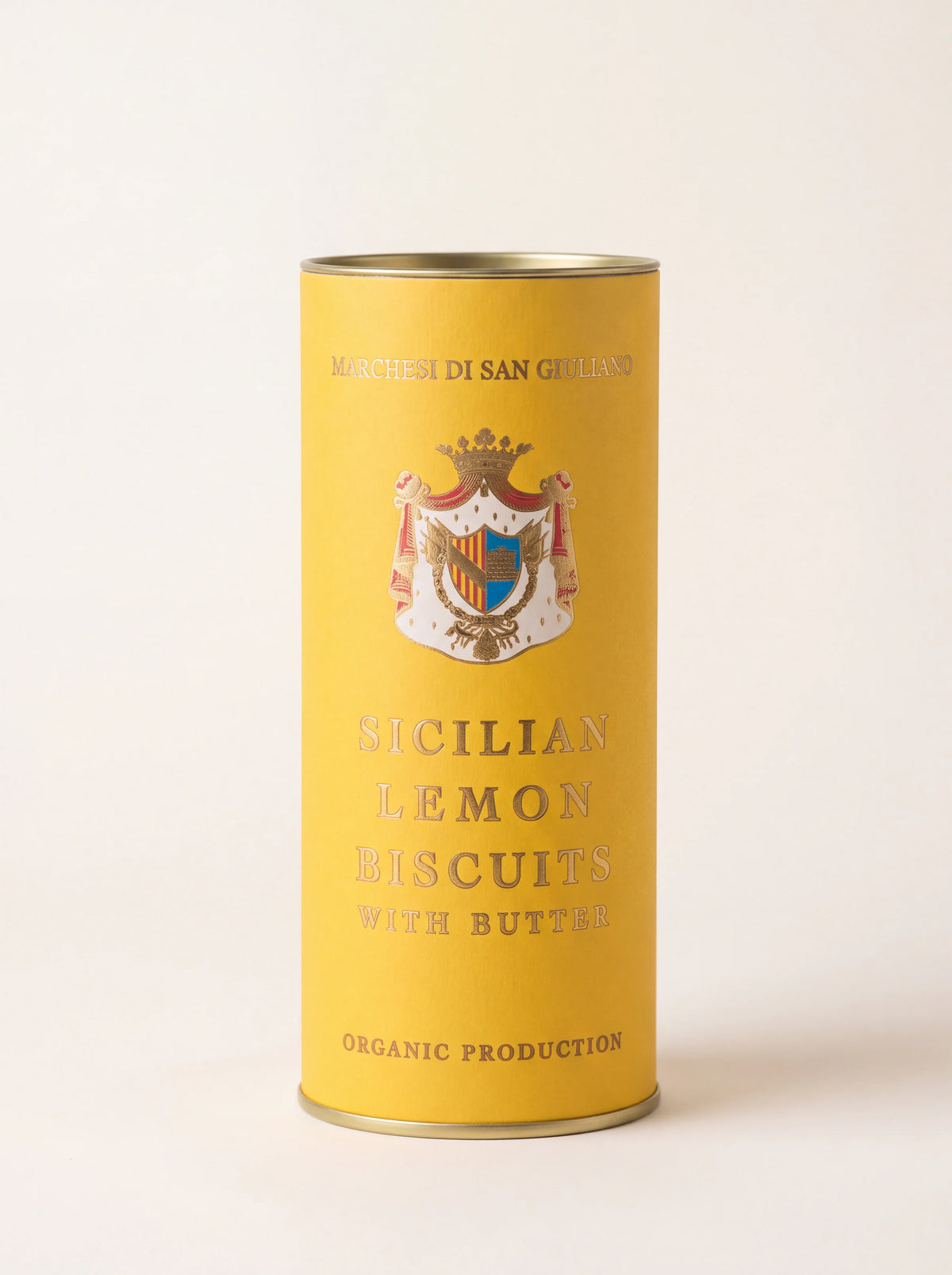 Sicilian lemon biscuits in a yellow cylindrical container with a metal lid and base