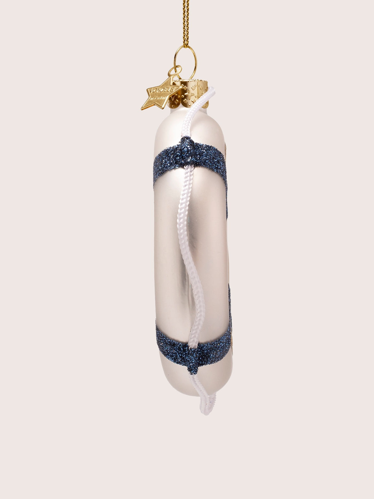 Side view of the lifebuoy ornament showing its slim profile and cord threaded through the blue bands
