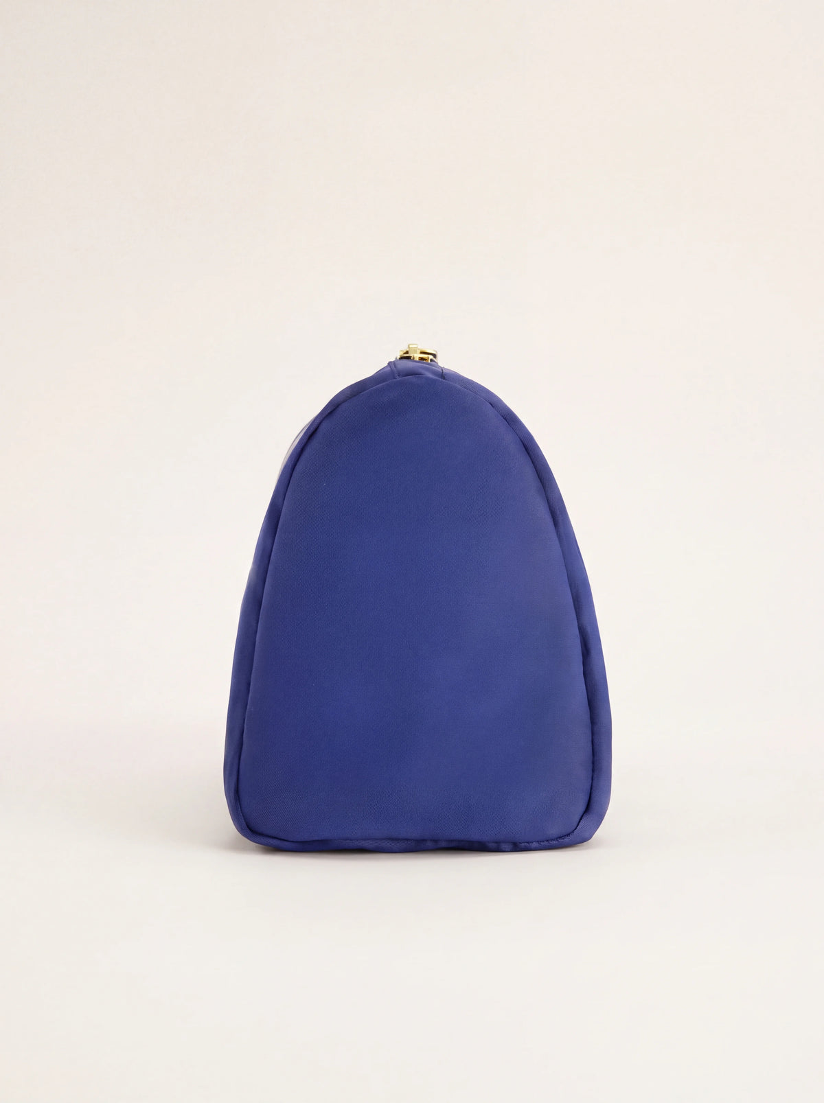 Side profile of the pouch displaying its triangular silhouette