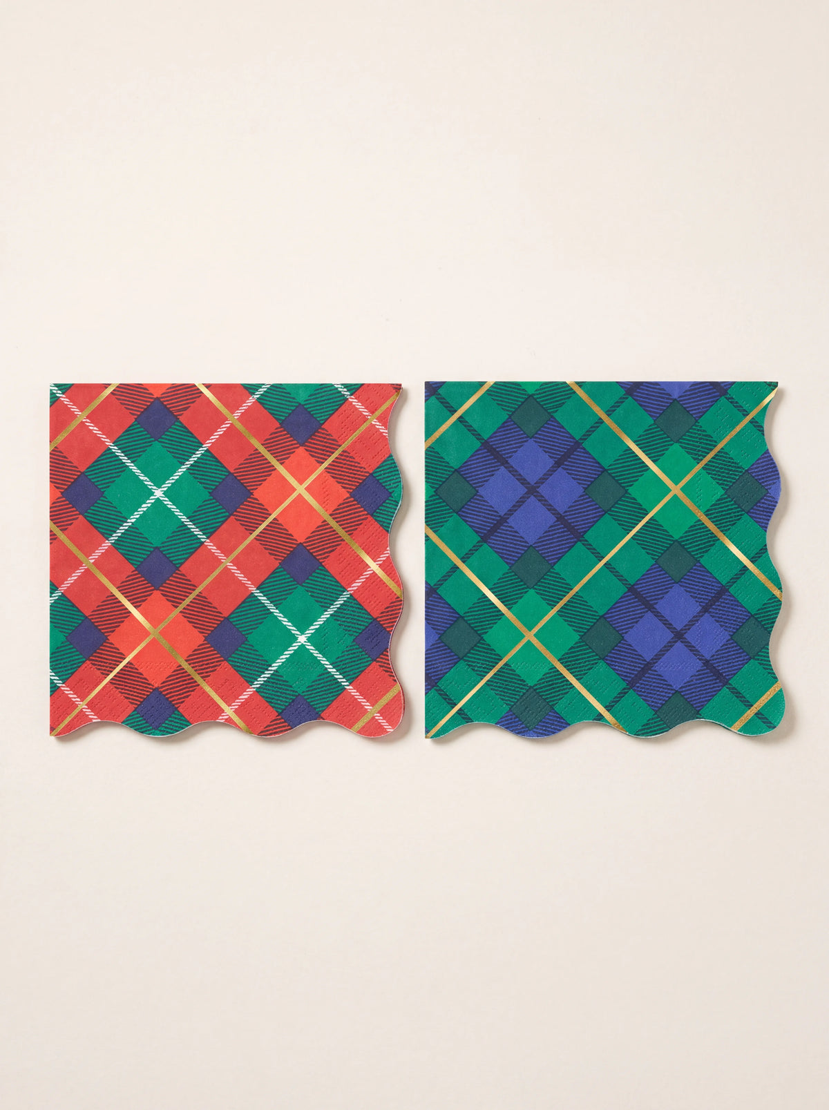 Tartan paper napkins with scalloped edges and gold foil stripes in red and green colourways