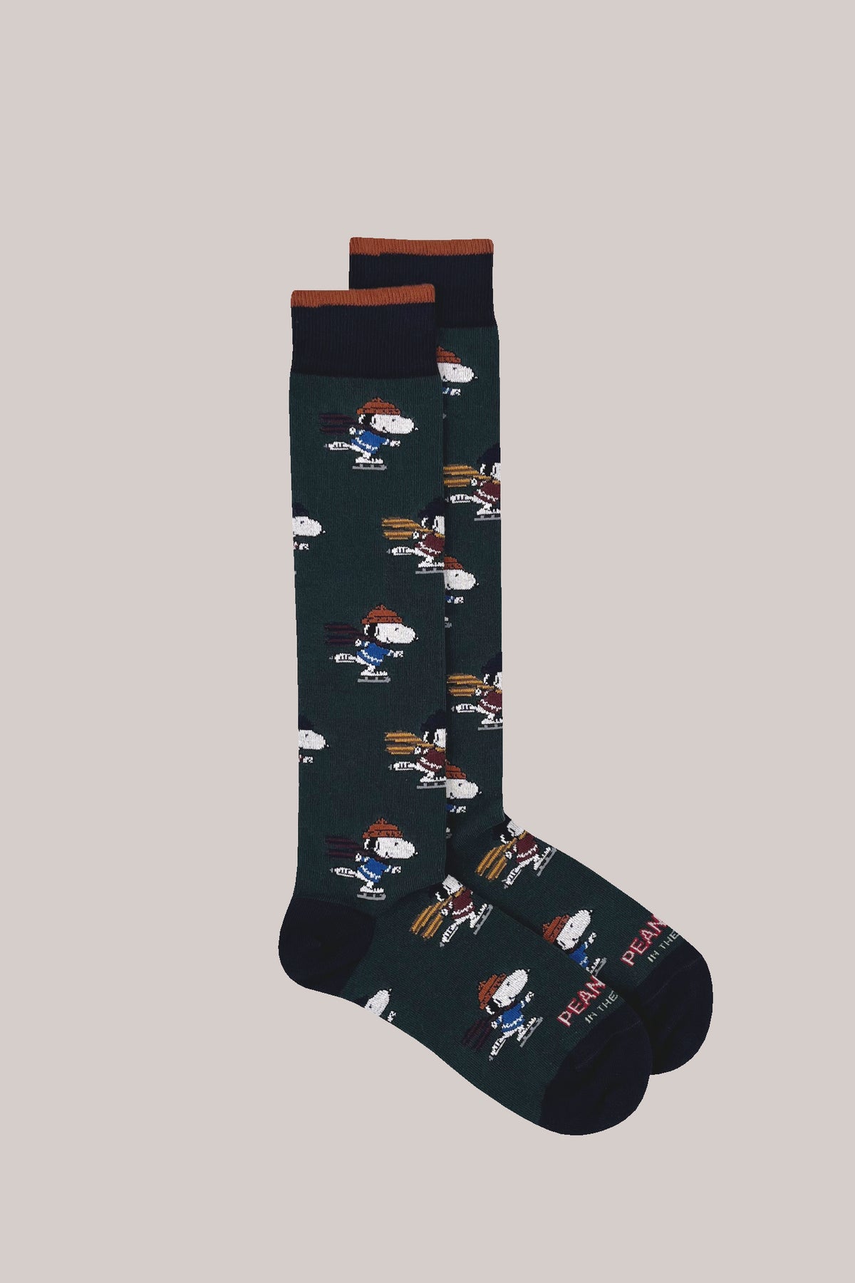 Dark green cotton-blend socks with ice-skating Snoopy motif, brown-trimmed ribbed cuffs, and dark heels and toes