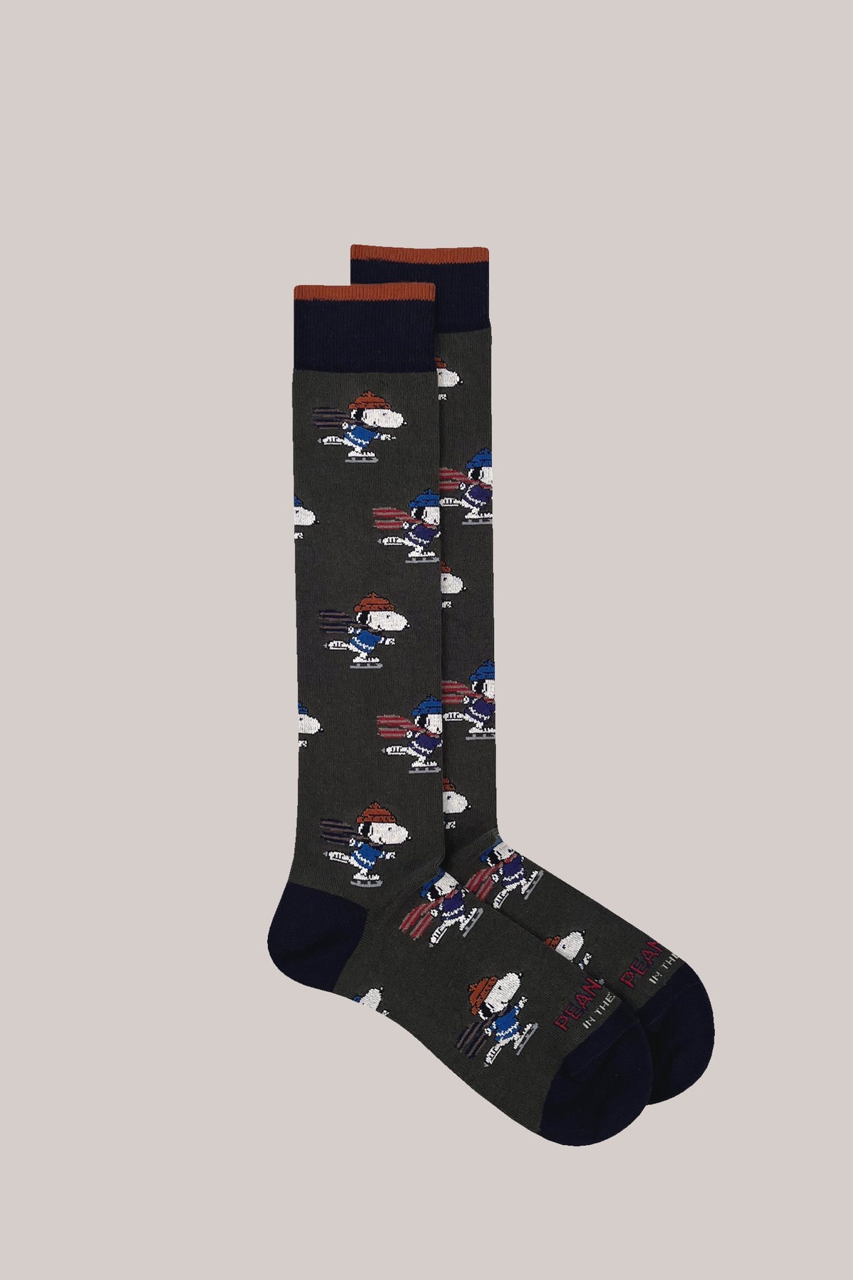 Dark green cotton-blend socks with an ice-skating Snoopy motif, navy heels, toes and striped ribbed cuffs